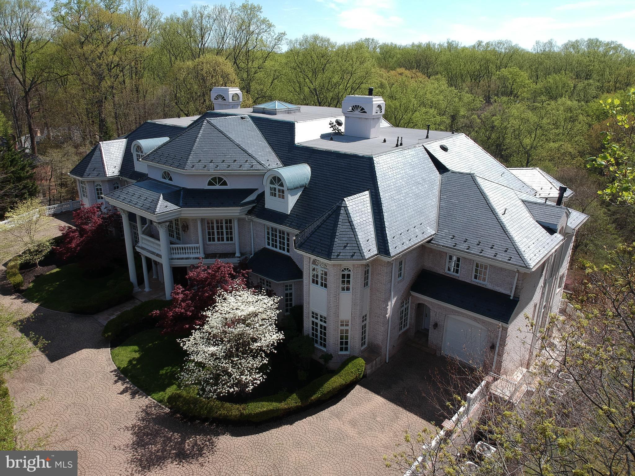 TRULY SPECTACULAR CUSTOM HOME IN BEAUTIFUL AVENEL! BEAUTIFUL,ETHEREAL DESIGN THROUGHOUT FEATURING GRAND FOYER & STAIRCASE W/ 37-FT CEILING & BREATH-TAKING CRYSTAL CHANDELIER. MAY BE THE LARGEST HOUSE IN MONT CO. 33,000 SQ FT. MULTIPLE LEVELS PROVIDE OUTSTANDING ENTERTAINING SPACES. PRIVATE QUARTERS. ELEVATOR, INDOOR POOL, TENNIS COURT, TERRACES W SWEEPING VIEWS, 4-CAR GARAGE. $11 MILLION ASSESSMT