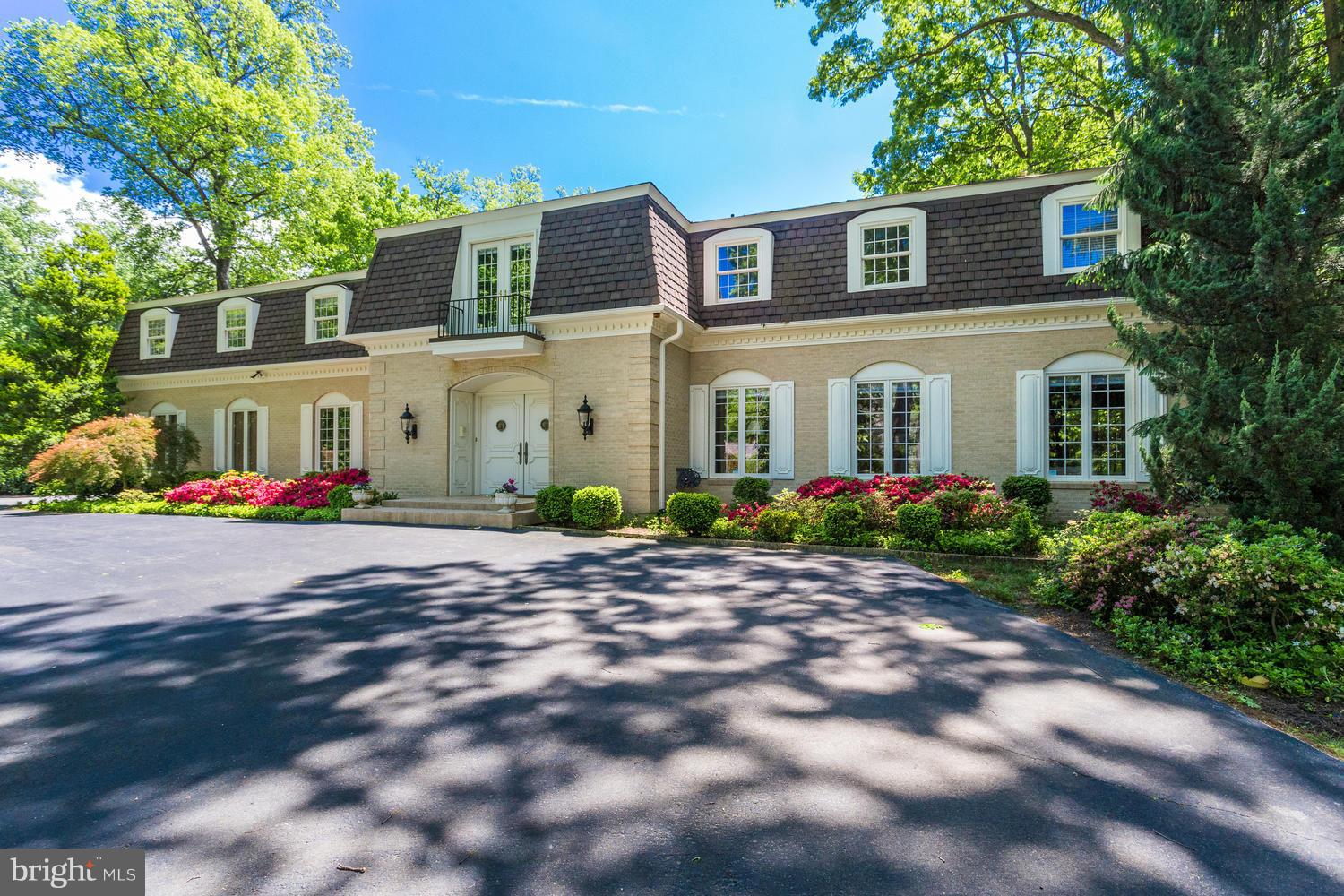 Custom-built 7,000+ sq-ft home on almost 2 acres. Amazing private backyard views with resort amenities to include a  pool and tennis/sports court.  Beautifully restored throughout the years, yet retains fine architectural features plus 5/6 bedrooms, 6 1/2 baths, embassy-sized living/dining rooms, wood-paneled library, wine cellar,4 fireplaces. New high-efficiency windows Large circular drive. Mins to Metro,Tysons 495,267,66,Langley High