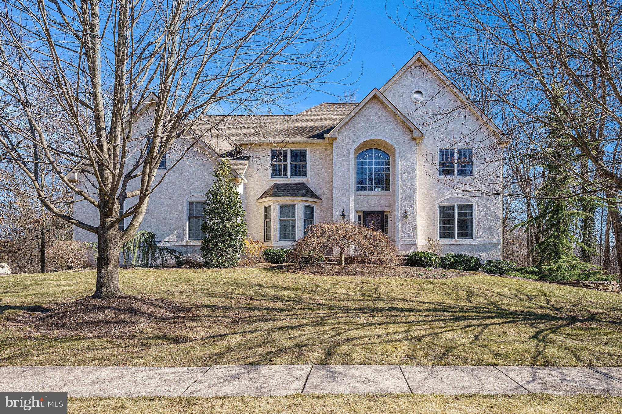 Welcome home to this meticulously maintained 4-bedroom, 2.1-bath colonial in the highly sought-after Kingwood Estates development! Nestled on a premium park-like lot, this stunning home boasts exceptional curb appeal, inviting guests into a sun-drenched, open floor plan spanning 3,664 sq. ft.  The main level welcomes you with a grand two-story foyer, flanked by a spacious formal living room and an elegant dining room—both featuring crown molding accents and gleaming hardwood floors. At the heart of the home, the gourmet kitchen impresses with granite countertops,  a center island with countertop seating, pendant lighting, 42” cabinets, stainless steel appliances, and a breakfast area with access to the expansive newer rear deck. Adjacent to the kitchen, the soaring two-story family room is a showstopper, highlighted by a floor-to-ceiling brick wood burning fireplace, large windows, and skylights that flood the space with natural light. A private home office with French doors and serene views provides the perfect setting for remote work. Completing the main level are a stylish guest bath, a convenient laundry room with cabinetry, direct access to the two-car garage, and an additional door leading to the deck. The upper level continues the open-concept design with a butterfly staircase and an overlooking hallway. The luxurious owner’s suite boasts vaulted ceilings, a separate sitting area, two walk-in closets, and a newly renovated en-suite bathroom featuring a dual vanity, soaking tub, and oversized stall shower. Three additional generously sized bedrooms with spacious closets share an updated hall bath. The massive unfinished basement offers endless potential with 9-ft ceilings, sliders to the backyard, and ample windows bringing in natural light—perfect for future expansion or abundant storage. The rear yard, backing to open township space, ensures both privacy and breathtaking natural views. Outdoor living is a dream with multiple spaces to enjoy, including a newer Trex deck and a lower-level patio—ideal for relaxing or entertaining. Pride of ownership shines throughout this home, with tasteful décor and numerous recent upgrades, including a new water heater, water softener, garage doors and openers, storm doors, interior lighting, front porch, deck, rear patio, landscape lighting, improved backyard drainage, and more. Prime location—just minutes from shopping, dining, parks, walking trails, major highways, and prestigious country clubs. With an excellent layout, unbeatable location, and incredible value, this home is a rare find. Only a relocation makes this sale possible—don’t miss out! Schedule your tour today!