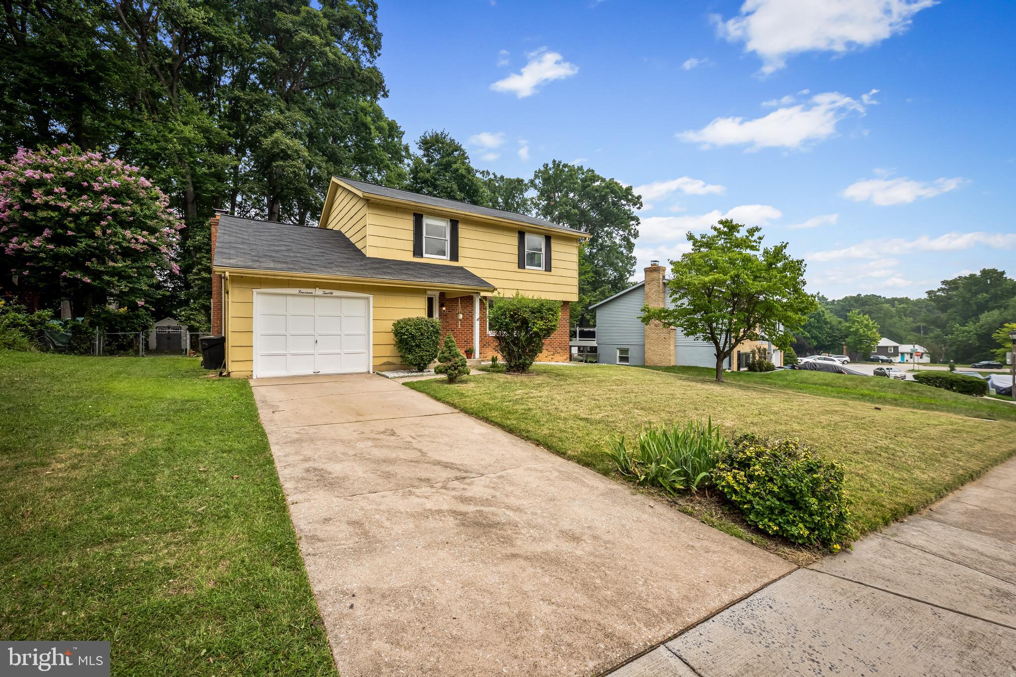 Come see this renovated 4-bedroom 2.5 bathroom house on Sunday July 19th 1-3pm! This Woodbridge Valley house has just been remodeled -- all three bathrooms updated with lovely tile showers, new fixtures, house is fully repainted, hardwood staircase refinished and basement wooden stairs painted, new floors installed on the first floor and part of the second floor. The house layout is wonderful -- easy flow from the entrance to the kitchen with a dining room on one side and powder room and den with a fireplace on the other that opens to the rear yard through sliding glass doors showing the lovely canopy of trees and a large, fenced yard with a useful shed. The dining room has a bay of three windows looking out to the green trees now and fall trees in a few months.  The living room has a large wall of windows with cheerful light. The garage has direct access from the kitchen and basement access from the foyer. There are 4 bedrooms and two full bathrooms on the second floor, one of which is a walk-in shower off of the primary bedroom. Both bathrooms have just been updated. The house has loads of bedroom closet space and household storage space in the basement, garage, and shed. The full finished basement has two large rooms and the washer/dryer and has endless uses such as workout, crafts, office, etc. The garage has been just painted and floor coated and is a large one-car with a driveway for at least a second car. The beautiful rear fenced yard has lovely trees and welcoming atmosphere with direct access from the Den through the glass sliding doors and the side fence.  Woodbridge Valley awaits!