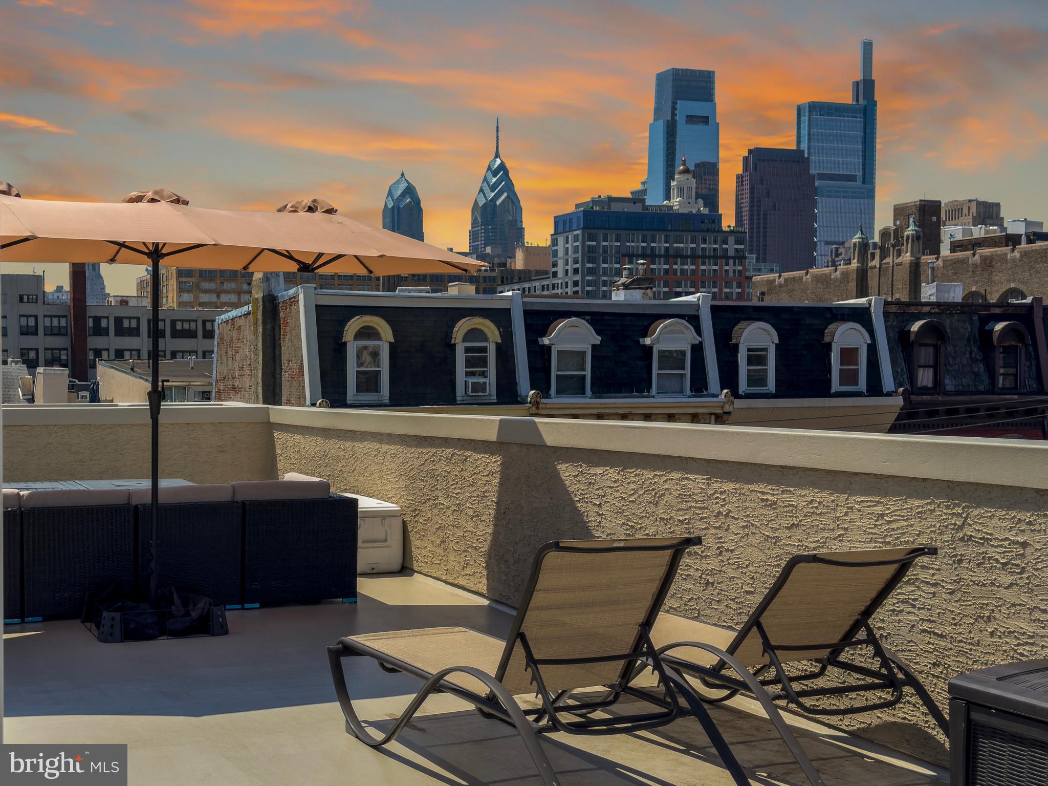 Want AMAZING ROOF DECK SKYLINE VIEWS and PARKING with MODERN LUXE interiors? Welcome home to 1211 Mount Vernon St #2 — a stunning and meticulously maintained, multi-level 2nd/3rd floors condo offering the perfect blend of modern comfort and vibrant city living in the heart of Philadelphia.

Spanning approximately 1,268 square feet across two thoughtfully-designed levels (plus roof deck), this 2-bedroom, 2-bathroom residence is filled with natural light and elevated finishes throughout. Oak hardwood flooring flows seamlessly across the main living spaces, and new trim accent walls create a warm, contemporary feel from the moment you enter.

The open floorplan is perfect for entertaining. The updated kitchen is both stylish and functional, featuring granite countertops, a glass tile backsplash, under-mount lighting, and stainless steel appliances, along with a dedicated eat-in area ideal for casual dining. Just beyond, the bright and airy living/dining area offers skyline views, creating a perfect setting for relaxing or entertaining. This upper level also includes a spacious primary bedroom and a bathroom showcasing a glass-enclosed shower with modern tile accents. On the other floor, a second bedroom, full hall bathroom, and convenient in-unit laundry round out the interior layout, providing flexibility for guests, a home office, or additional living space. Both bedrooms feature trim accent walls for the latest trend in modern, luxurious living. 

Crowning the home is a private roof deck with sweeping 360-degree views of the Philadelphia skyline — an ideal retreat for morning coffee, evening sunsets, or hosting friends underneath the stars. An un-deeded, off-street parking space in a  lot behind the unit is available and has been used by the current owners for years.

Located just steps from some of the city’s most beloved dining and entertainment destinations — including Cafe Lift, Osteria, Cicala at the Divine Lorraine, SOUTH Restaurant & Jazz Club, Juno, La Chinesca, The Met, Bar Hygge, and all that bustling Fairmount Avenue offers — this home places you right in the center of the action while still offering a peaceful residential setting.

The low condo fee includes building insurance, adding peace-of-mind to ownership.

A rare opportunity to own a move-in ready home with outdoor space, skyline views, and unbeatable proximity to some of Philadelphia’s best restaurants and culture. Schedule your tour today!