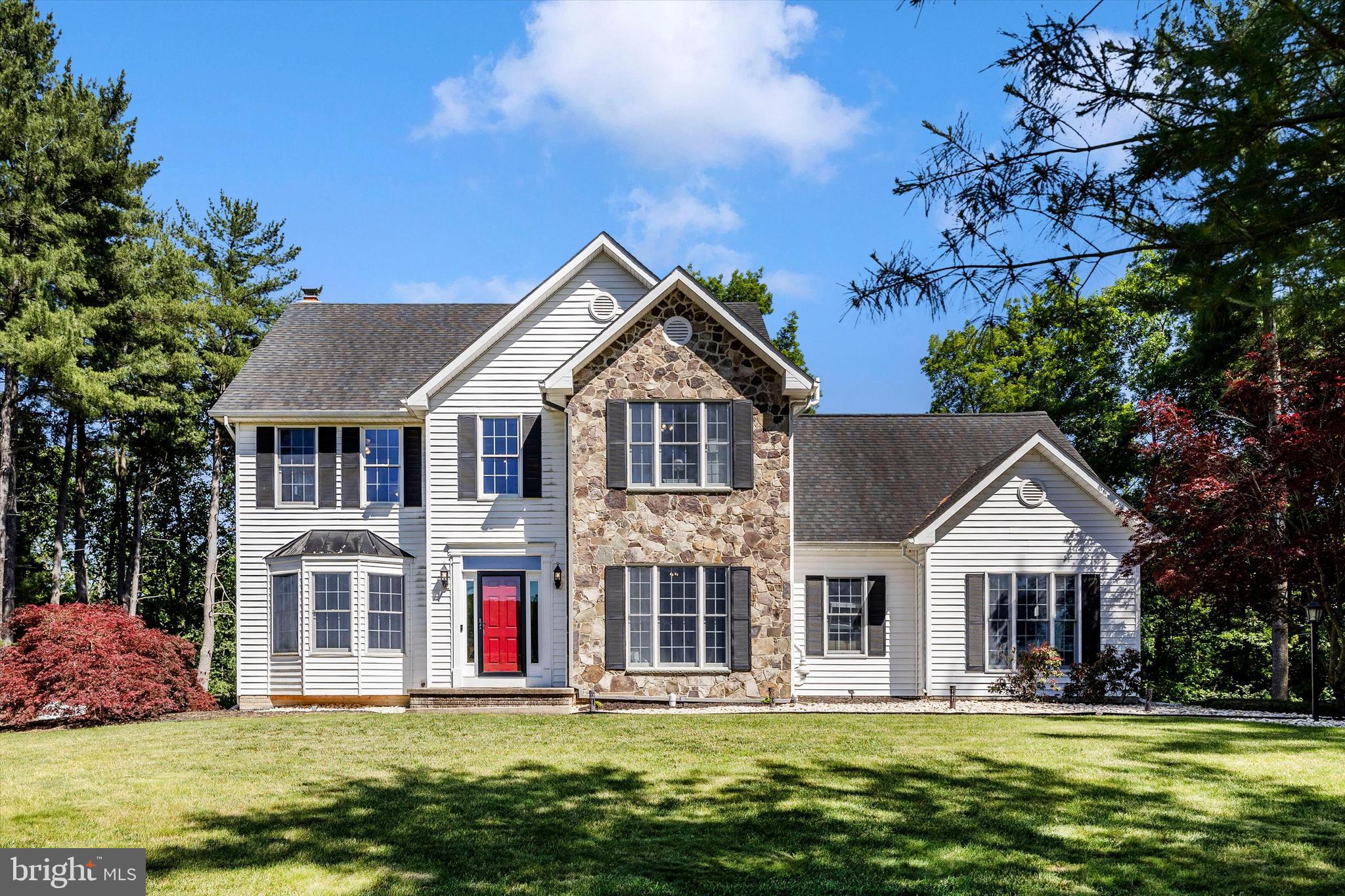 Set at the end of a long private driveway and tucked quietly into 2.5 secluded acres, this exceptional colonial offers the kind of setting buyers spend months searching for and rarely find. Surrounded by peace, privacy, and mature countryside, the property delivers a true retreat from the pace of everyday life—while still remaining conveniently close to shopping, dining, commuter routes, and modern amenities. In other words, you can enjoy the sounds of nature without giving up your Amazon deliveries.

From the moment you arrive, it’s clear this is not your average colonial. The dramatic two-story foyer immediately sets the tone, leading into a thoughtfully designed floorplan accented by hardwood flooring, elegant crown and chair moldings, formal living and dining rooms, and a massive butler’s pantry that feels straight out of a custom home magazine. The home balances warmth and sophistication effortlessly, creating spaces that feel equally suited for large gatherings or quiet evenings away from the world.

The kitchen has been tastefully upgraded with granite countertops, a custom backsplash, and updated appliances including a new dishwasher, refrigerator, washer, and dryer. Recessed lighting throughout the main living areas, new LVP flooring on the main level, and brand-new carpet upstairs give the home a fresh, polished feel without sacrificing character. Every improvement was clearly made with long-term ownership in mind—not quick resale decisions.

The bathrooms have been fully remodeled with updated tile, cabinetry, sinks, toilets, flooring, light fixtures, and shower doors, while major system upgrades provide the kind of confidence buyers appreciate but don’t always find. Improvements include a new Trane propane furnace, humidifier, radon mitigation system, water softener, basement air ducts, stainless chimney liner, new fireplace door, two Larson storm doors, and two brand-new insulated garage doors.

Quite simply, this is one of those homes that stands apart the moment you pull in the driveway. Private without feeling isolated. Luxurious without trying too hard. Meticulously upgraded without losing the comfort that makes a house feel like home. Properties with this combination of land, condition, location, and presence do not come available often—and the buyers who recognize that tend to move quickly.