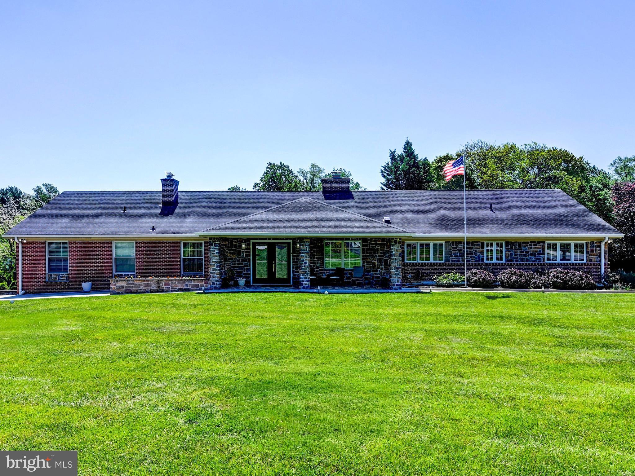 YOU NEED TO SEE THIS FOR YOURSELF!!! 
Attention to detail shows everywhere in this 6000 s/f rancher that has has 5 Br's & 4.5 BA's where everything has been enlarged, redesigned, remodeled and upgraded throughout from the covered front entry to the special
Interior! The upper level has 4 bedrooms. And there is 1 more bedroom (currently being used as the poker table game room) in the lower, walkout level. Also included in the lower level is the rec room area with a bar, a big laundry room, full bath, utility & storage area, and convenient to walk out to the pool area. Every door in this home has been replaced with European-designed doors, stunning bathrooms, mahogany floors throughout, new HVAC systems, a brand-new large 75-gallon water heater, new
 kitchen & appliances, new fencing, and cabinetry in the entire home has been upgraded. Plus--- the original home has doubled in size with easy living and entertaining in mind! Huge,
 spacious rooms, additions, 2 driveways! - one directly to the refloored oversized 2 car garage with a Tesla charger. The ground level attached wine room/pool house boasts a covered rear
 patio off the living room overlooking the inground pool and fenced yard. All electric and water services have been improved. The entire home is serviced by an ethernet service and an
 extensive security system (camera & lights). Also included are the solar panels, the full house generator, kitchen water purifier, 3 zoned A/C, 2-sided f/p, main level TV room, insulated walls, and extra land included on side of home.
