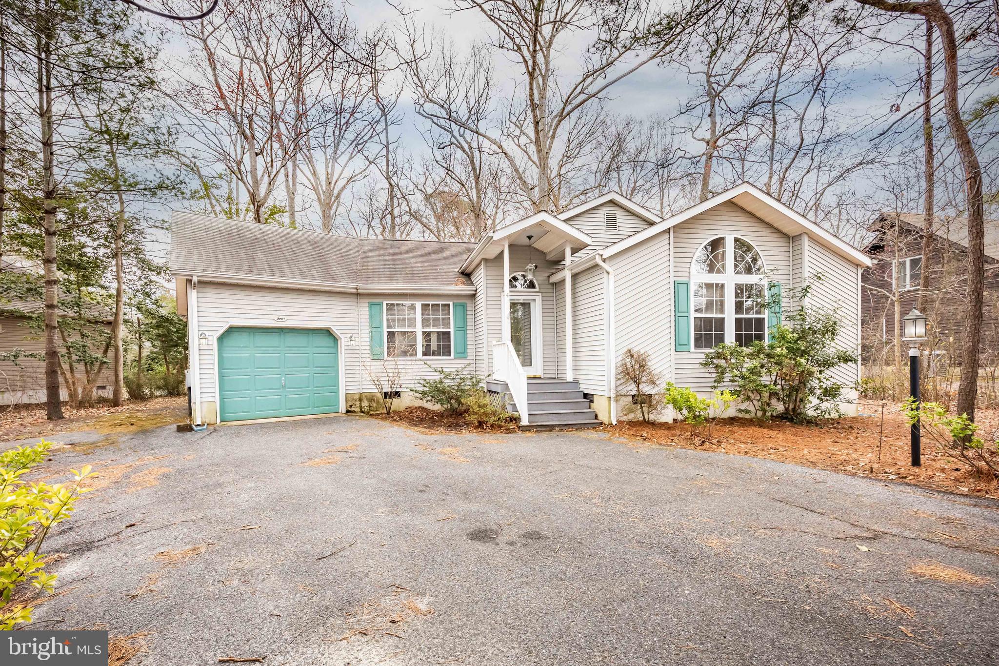 Back on the Market... NO FAULT OF THE SELLER!!! Welcome to 4 Breezeway Lane. This adorable 3 Bedroom 2 Bath Beauty is sure to please. Featuring an open floorplan with vaulted ceiling, there is plenty of elbow room for day-to-day activity. The 4-season sunroom offers additional seating space and great natural light to tuck away with your morning coffee for some quiet time. Some of the upgrades include Granite Countertops, SS appliances, updated cabinetry, hardwood flooring, and tasteful Built-Ins. There is an ample sized owner's suite with Double closets and private bathroom. Off the owner's suite there is a large, screened porch that is also accessible from the exterior space. Add two more bedrooms and an additional bath to complete this beautiful interior area. There is large fenced in backyard for your entertaining and an attached garage for additional storage. Book your showing today!!!