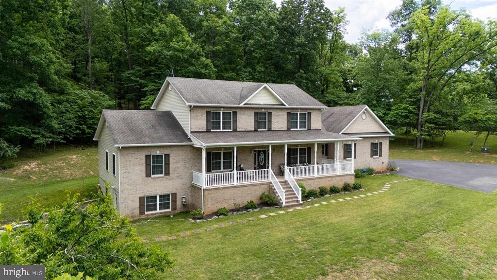Welcome to this beautifully maintained home in the highly sought-after Walnut Springs Estates subdivision, offering exceptional space,comfort, and versatility on a private 2-acre lot. With up to 7 bedrooms and 3.5 bathrooms, this property is ideal for growing families, multi-generationalliving, or those who simply desire room to spread out. The inviting living room features a cozy electric fireplace, creating a warm and welcomingatmosphere for gatherings and everyday living. The thoughtfully designed floor plan provides generous living spaces throughout, while the basementapartment offers excellent flexibility for guests, extended family, rental income, or a private home office. Enjoy the outdoors year-round from thescreened-in back porch overlooking the expansive property. Additional highlights include a large attached garage, abundant attic storage, and plenty ofroom both inside and out for all your needs.
