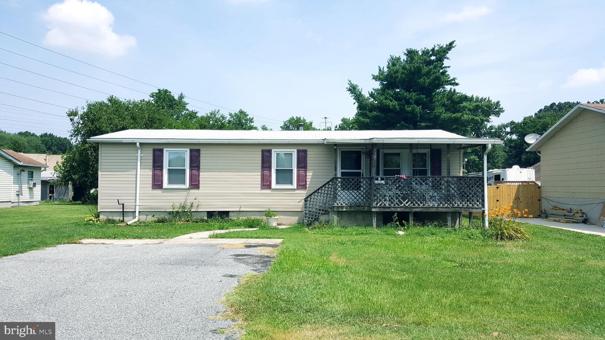 Lovely 3 bedroom home with an additional 1/5 acre lot included in the sale! Gain extra land or have a family member build at a great value! 25 year roof replaced in April 2018. 1 car detached garage. Unfinished basement.  Nice sized bedrooms. Large bathroom. Open dining room into kitchen.  Front and back porches. Quiet street.