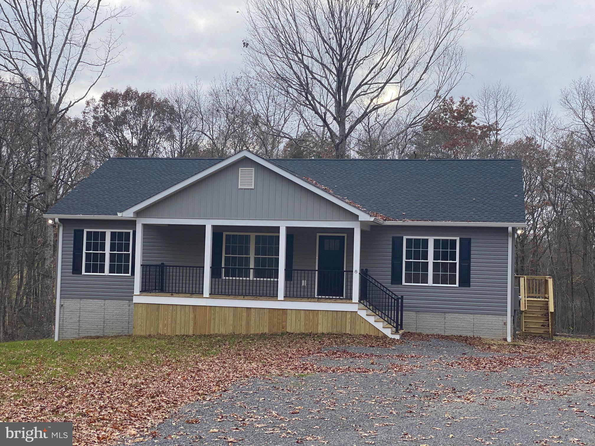 New construction READY NOW. Address is 8 Roebuck Rd. Aroda VA.  One level living with full unfinished basement on 4+ acres near Town of Madison.  Great location. Another quality  built home by Country View Homes, LLC. Upgrades include:  granite countertops, upgraded cabinets,  & stainless appliances; tiled primary bath shower; basement bath rough in; painted concrete basement floors with potential for buyer to build out 4th BR; three windows in basement wall; walkout basement; French door to 12'x16' rear deck with steps to grade; many recessed lights; lights in bedroom closets and more. Pretty lot with nice open back yard. The drain field is for a 4 bedroom home and will be installed as designed even though builder is only finishing as a 3 bedroom home. House specification sheet info and plat available.