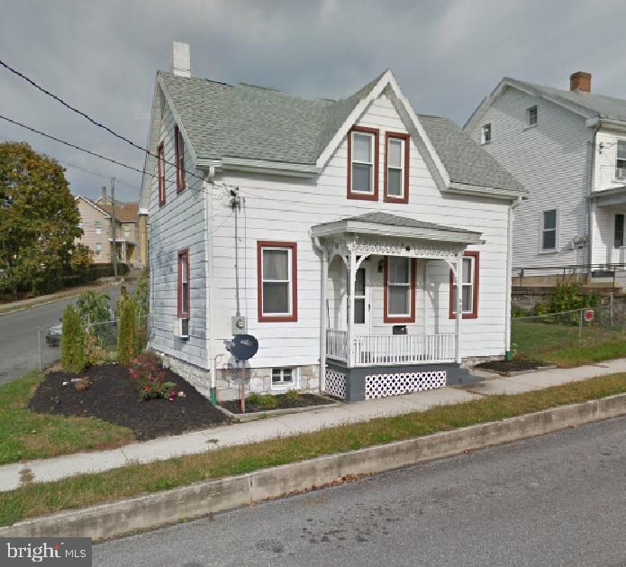 Perfect starter home or investment property! Located in Chambersburg Borough just outside of the downtown hustle and bustle.  This corner lot house with a fenced yard and open kitchen/dining area has a spacious living room, two bedrooms and a full bathroom on the upper level with a convenient half bathroom and laundry room on the main level.  The location is ideal being walking distance to downtown retail, walking trails and easy access to Route 11.  Take a tour today and start investing in your first home or your real estate portfolio!