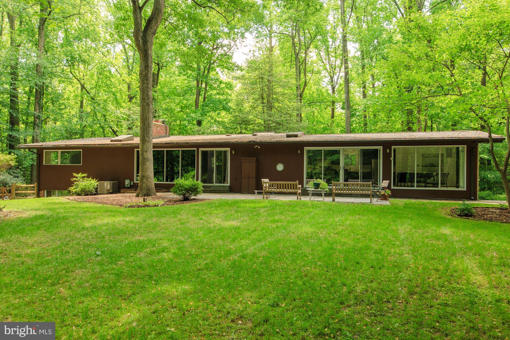 PICTURESQUE PARADISE ON OVER AN ACRE IS THE SETTING FOR THIS SPACIOUS LIGHT FILLED 4 BRM 3 BATH CONTEMPORARY!  WIDE 2-STORY FOYER OPENS TO GRACIOUS LIVING RM & FP,  DEN WITH PATIO & GLORIOUS VIEWS. KITCHEN WITH ISLAND & BREAKFAST RM JOINS FAMILY RM,  ALL OVERLOOKING LUSH GREENERY.  SPACIOUS BRIGHT MASTER BEDROOM & BATH, 3 ADD'L FAMILY BEDROOMS. GORGEOUS POOL .