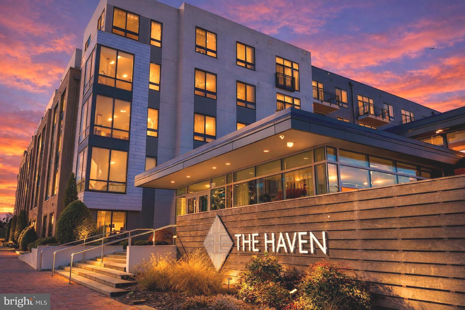 ** INCREDIBLE VA Assumable loan @ 2.25% at this price!  Don't miss this opportunity!** Elevated at The Haven, this Penthouse residence is defined by big-sky views, golden-hour light, and a stunning evening backdrop stretching toward MGM and beyond. This exquisite meticulously designed residence features two bedrooms and two full baths, generously illuminated by natural light through its soaring windows.  The gourmet kitchen is a culinary enthusiast's dream, outfitted with stainless steel appliances, sleek quartz countertops, and custom two-tone cabinetry. Designer lighting fixtures add a touch of modern elegance, complementing the expansive living areas. The primary suite boasts a good-sized walk-in closet, providing ample storage, and the convenience of garaged parking ensures effortless urban living. In fact, the parking spot for this amazing condo is about as close to the elevator, which is about as close to the condo, as you could want. Super convenient!  Beyond the private sanctuary of your home, THE HAVEN redefines luxury with over 15,000 square feet of world-class amenity spaces. Residents enjoy exclusive access to a resort-style outdoor pool, a state-of-the-art fitness facility with an adjoining yoga studio, a sophisticated resident lounge complete with a billiards table, a dedicated pet spa, secure bike storage, and much more, fostering a vibrant community atmosphere.  Adding to The Haven’s appeal is its highly attentive concierge service — known for their professionalism, friendliness, and commitment to making everyday life easier. Whether it’s greeting guests, assisting with deliveries, or providing helpful local tips, the concierge team plays a key role in making The Haven feel more like a boutique resort than a residential building. Their presence is one of the many reasons residents find this community so desirable.  These amenities continue to be a significant draw, even for residents of newer developments.  Step outside and immerse yourself in the dynamic energy of National Harbor. With over 160 retailers and restaurants just moments from your door, a world of dining, shopping, and entertainment awaits. Indulge in celebrity chef experiences at Succotash or Fish by José Andrés at MGM National Harbor, savor fresh seafood at The Walrus Oyster & Ale House, or enjoy upscale Asian fusion at Grace's Mandarin. For a more casual outing, explore the diverse culinary landscape or enjoy lively entertainment at Bobby McKey's Dueling Piano Bar.  National Harbor offers an array of attractions, including the iconic Capital Wheel for breathtaking panoramic views, scenic waterfront trails perfect for leisurely strolls or invigorating runs, and the captivating The Awakening sculpture. For luxury shopping, Tanger Outlets features over 85 designer brands.  The strategic location provides unparalleled connectivity to the greater DMV area. Downtown Washington D.C. and historic Old Town Alexandria are mere minutes away, easily accessible by car or the convenient Potomac Riverboat Company Water Taxi, which also offers routes to The Wharf and Georgetown.  This penthouse at THE HAVEN offers not just a home, but a gateway to a sophisticated, amenity-rich lifestyle at the heart of the capital region, maintaining its status as a premier choice in National Harbor's evolving luxury real estate market.