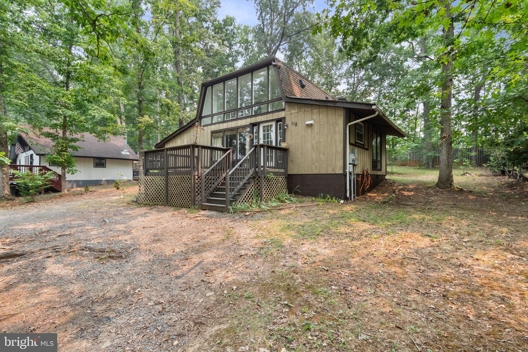Welcome to 112 Lakeview Parkway!

Charming and move-in ready, this 3-bedroom, 1.5-bath home is tucked away in the sought-after Lake of the Woods subdivision.   Freshly painted throughout, the home is filled with natural light thanks to large, spacious windows that bring the outdoors inside. Spacious flat back yard with shed provides ample storage. 

Built in 1971, this home offers 1,153 total square feet of comfortable living space. Recent updates offer peace of mind: a newer HVAC system (2017), hot water heater (2021), and roof (2013). Enjoy all the amenities Lake of the Woods has to offer, in a location close to the front of the community for easy access.

Come make this property your own.  112 Lakeview Parkway would make an adorable air b and b or long term rental if your thinking about the future.

Enjoy the two Lakes and the many water sports available such as fishing, boating, jet-skiing, tubing, water skiing or wakeboarding, paddleboards or kayaks. Enjoy fine dining at the clubhouse or sharing a beverage with friends while watching your favorite sporting event at the Clubhouse Sports Bar or the Woods Center. Jump in one of the two Swimming pools or work out in the state-of the- art Fitness Center. If you like rackets -LOW has lighted Pickleball and Tennis courts. If theater is your thing-enjoy the LOW Players performances at the Community Center. Over 60 clubs offer something for everyone. Hit the fairways at the 18 Hole PGA Golf Course and enjoy the 19th Hole at the Woods Center. Let's not forget the community Equestrian center with boarding, riding programs, rings, and organized events. Two barns, 21 stalls, outdoor show ring, dry-lock paddocks, wash stalls and so much more. Surrounding areas provide a beautiful backdrop for trail riding. So much to do, so little time- Get Started Now! 

Electric is provided by Rappahannock Electric Cooperative, with public water and sewer serviced by Rapidan Service Authority. Trash and recycling are handled through the community's dumpster and recycling location at 100 Shoosmith Rd.

Don't miss your chance to call this beautiful home yours!