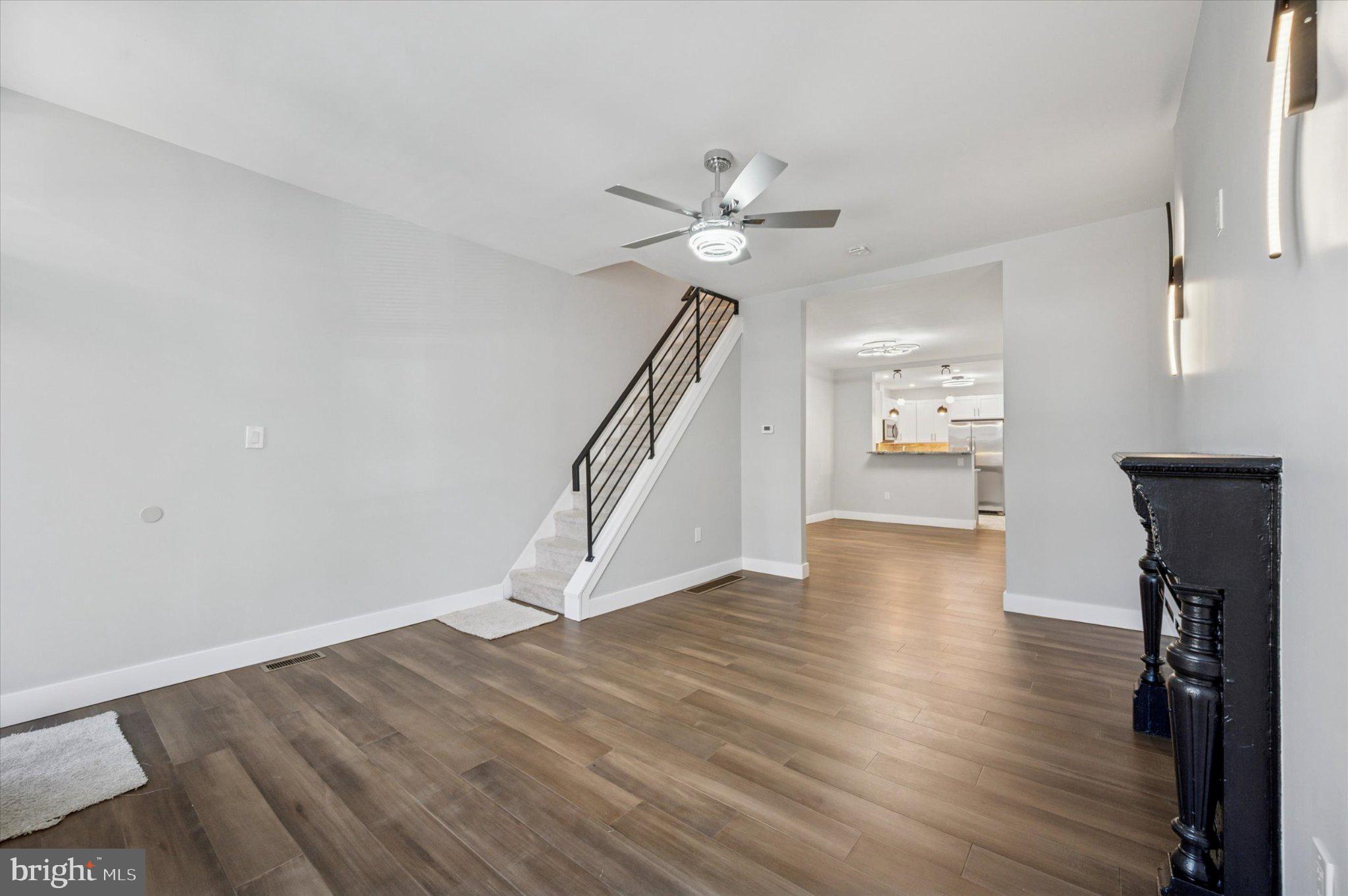 $10,000 Price Reduction!!!! Step into elegant comfort with this beautifully completely renovated 3-bedroom, 2 bathroom home, where charm meets modern luxury. Thoughtfully redesigned from top to bottom, this home showcases a flowing open-concept layout, stylish finishes, and exceptional attention to detail throughout. The light-filled main level features wide-plank wood-style flooring and a neutral designer palette that enhances the home’s airy and inviting atmosphere. The elegant living room centers around a stunning gas fireplace with a classic mantle—perfect for cozy evenings and entertaining. At the heart of the home, the gourmet kitchen boasts granite countertops, gorgeous custom cabinetry, stainless steel appliances, and pendant lighting above a breakfast bar that opens seamlessly to the dining room.   Both bathrooms have been completely renovated with sleek, modern fixtures and tasteful tile work, offering a spa-like experience. The three spacious bedrooms provide comfort and flexibility, ideal for guests, home office space, or every day living.  Step outside to your private backyard oasis—featuring a new patio and a fully fenced yard. Whether you're enjoying morning coffee, hosting summer barbecues, or gathering around a fire pit under the stars, this space is designed for relaxation!  Additional features Include:  3 spacious bedrooms, 2 fully renovated bathrooms, gas fireplace with custom mantle, recessed and designer lighting, new heater and air conditioner, and main floor laundry room.  Nothing to do here...just move right in!  Schedule your private tour today and make an offer!