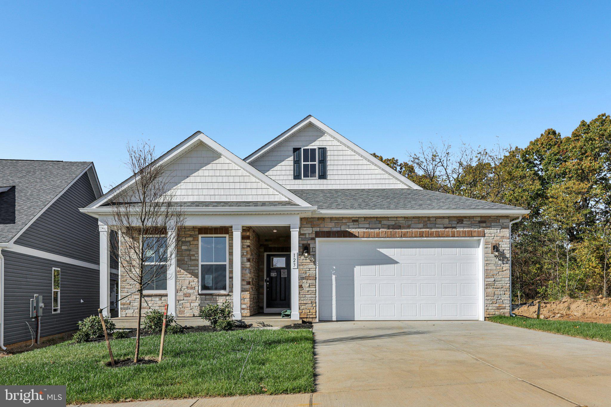 Experience effortless living in our Willow Run Active Adult community! Our Bristol floorplan is a thoughtfully designed 1,748 sq. ft. ranch home, blending style and functionality in a single-level open layout.
The moment you step inside the home; you will be greeted by an inviting foyer leading you into the heart of the home. The dining room seamlessly connects with the living room and kitchen, ideal for entertaining. The chef’s kitchen boasts stainless steel appliances, a walk-in pantry, and a breakfast bar. From the breakfast nook, step through the sliding glass door to a covered porch, perfect for outdoor gatherings or morning coffee. The main level also features three generously sized bedrooms and two modern bathrooms - including a serene owner’s suite with dual vanities, a tiled walk-in shower, and generously sized walk-in closet.
Need space for visiting friends or family? The finished basement offers an additional 1,070sq. ft. of a living space with a rec room, full bath, and bedroom – plus a large unfinished space for storage.
Completed with a large laundry room, two-car garage, and a low-maintenance lifestyle, the Bristol offers comfort and convenience. Embrace one-story living and make The Bristol your perfect new home this August!
*Photos, 3D tours, and videos are representative of plan only and may vary as built.*