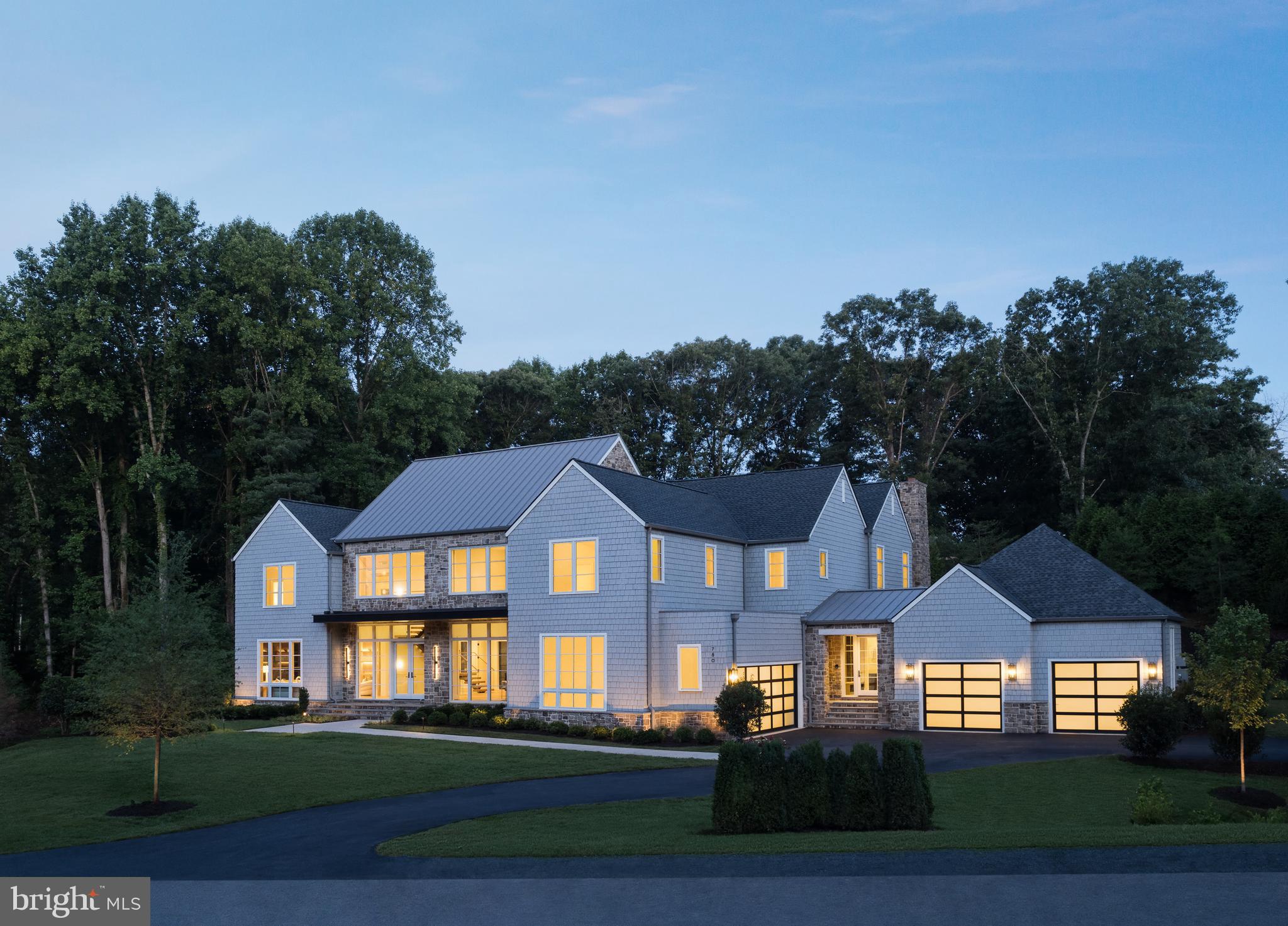 Artisan Builders is offering a newly built custom home
Located at 780 Falls Farm Court in Great Falls, Virginia. This home, designed
by Harrison Design, is a three-level, 10,306-square-foot home
featuring an upper-level primary suite with three additional en-suite
bedrooms, a main floor with dual home offices, gourmet kitchen
with butter’s pantry with induction oven, and mudroom. The lower
level includes an exercise room, golf simulator, and bar. The model’s
outdoor spaces include a pool with automatic cover, fire pit, shower, kitchen, and two
separate two-car garages.  Other features include, open stair with glass railing, wide plank engineered flooring, lawn irrigation, and elaborate landscaping.  This new community of Falls Farm, offers 14 two+ acre lots. Each mature estate features rolling hills,
full-grown trees, and enough square footage for unique and spacious
pools, sports courts, and more.  Other building lots available