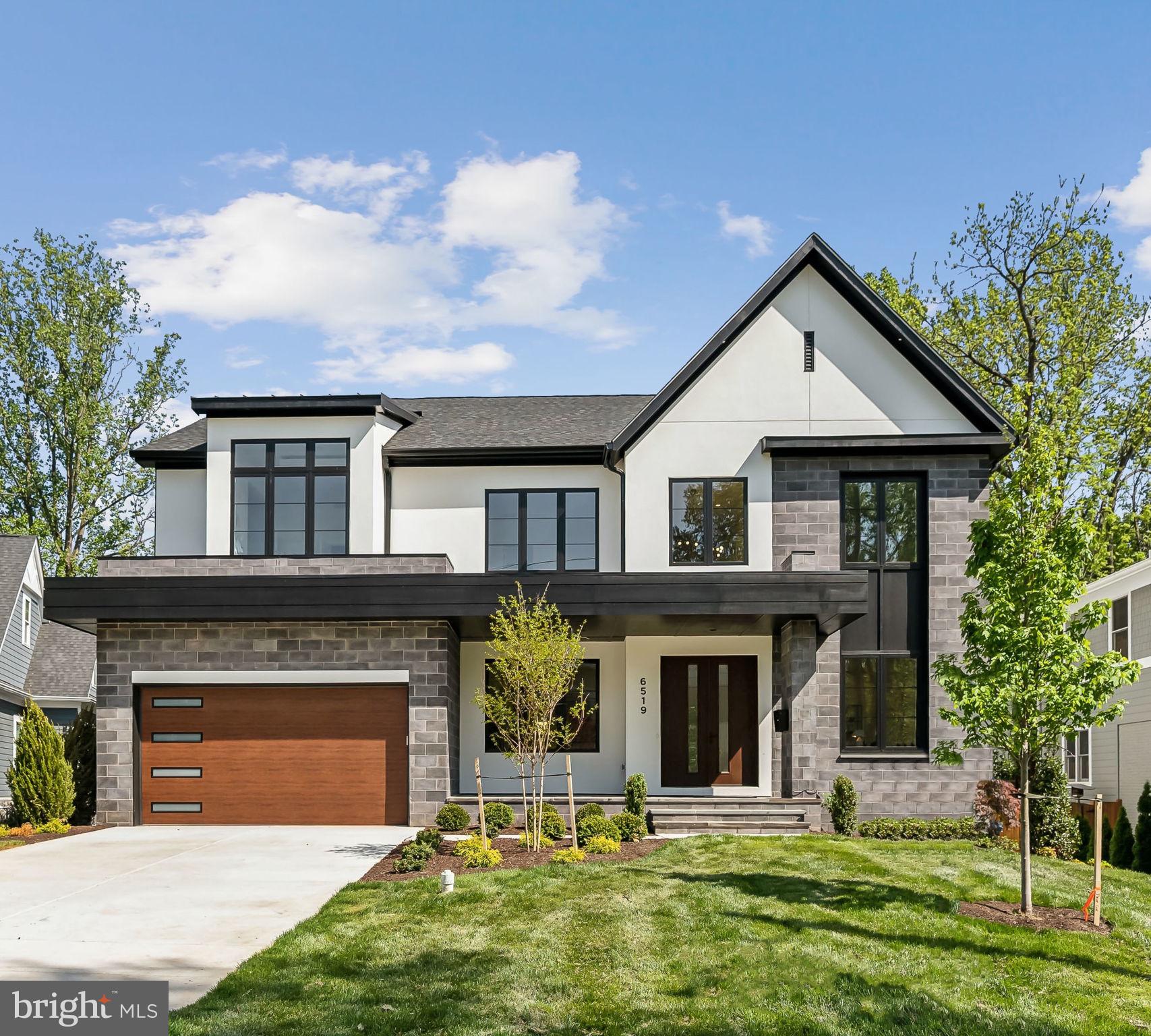 BRAND NEW HOME by award-winning Classic Homes of MD in sought-after Whitman District is now complete and a furnished model home.  This expansive home with in-ground swimming pool features over 6,500 sq feet of living space carefully designed for the modern lifestyle – including a main level in-law suite and finished lower level. 

The interior architecture can best be described as a contemporary vision of mid-century modern design.  A curated selection of elements throughout pay tribute to the era, creating a warm and organic atmosphere. Refreshing walnut stains and paint colors are further enhanced with the choice of tiles with natural movement, and decorative lighting to heighten the experience.    Thermador appliances, Brizo kitchen faucet,  and stylish designer light fixtures from Visual Comfort, Vesper and more exude a sense of timelessness, while ensuring the dependability of your home for years to come.  ONLY NEW HOME ON THE MARKET IN THIS PRICE RANGE WITH A POOL!
