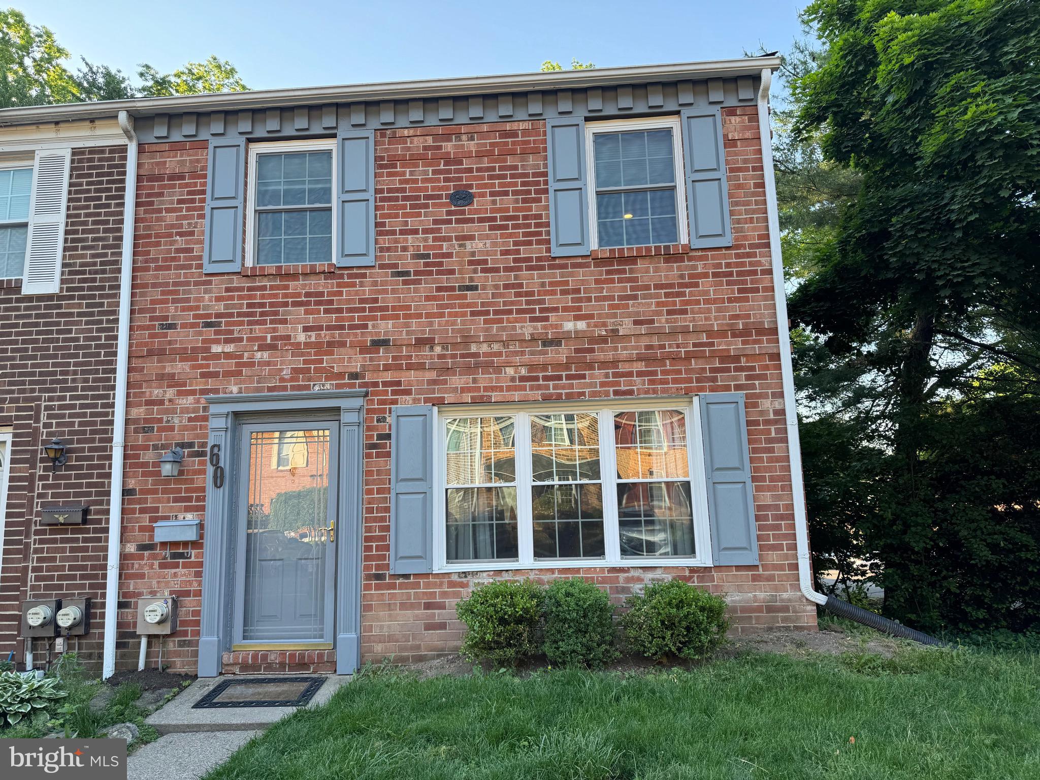 Wonderfull Opportunity  for a Beautiful Full Brick front rarely  offered END UNIT!   Situated on a Spectacular semi private wooded setting  location within the Community!!  This spacious open floor plan Home features 3 bedrooms and 2 1/2 baths.  This Home has been upgraded through the years  featuring  a spectacular designer Kitchen featuring a central island and gorgeous upgraded cabinets.  Granite countertops with a tile backsplash.   The TRIPLE WINDOWS in Breakfast Area and Great Room have been replaced for natural brightness and comfort. , Interior raised panel doors w brushed nickel hardware were installed,  . For extra peace of mind and comfort, the ROOF 2018, HVAC system 2018 and WATER HEATER 2018.  Spacious owner's suite features new carpet, 2 spacious closets, recessed lighting and a gorgeous custom tiled Bath for relaxation.  This Home is spacious and bright bringing old world charm back with today's modern luxuries.  Recessed lights in Kitchen and Owner's Suite,  tile floors in entrance foyer, powder room and large eat-in kitchen for easy care.   Home also has a REAR DECK with views of Community Playground. and a wooded setting. The Home has a  unique double-sided brick GAS FP which serves the  Kitchen and Great Room.   Washer and Dryer included.   Incredible location to fine shoppes, restaurants and wellness centers.  Award winning Central Bucks Schools!!