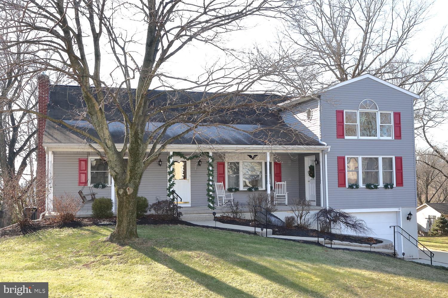Just a well maintained home situated on a great country lot in Elizabethtown, complete with numerous upgrades. You'll appreciate the 4 bedrooms, 2 on the main level and 2 on the upper level along with a full bath on each floor. An amazing floor plan, a spacious kitchen with granite countertops, tile backsplash, a breakfast bar area, plus all the stainless steel appliances. A step away is the laundry for your convenience complete with the washer and dryer. Tons of space in the first floor family room with access to the second floor and to the front porch. Feel comfortable in the living room which looks into the formal dining room accessing the deck. Upstairs are the bedrooms, one with a balcony, the second bath, plus an open area, great as an office or computer place or even just an area to "kick back". Did I mention there is tons of storage throughout. Also included is a generator for the house and a hardwired air compressor, plus the water is heated by Solar panels. A really neat aspect is there are 2 sets of stairs to the second floor,  conventional stairs from the living room and a spiral staircase in the family room. In the lower level you can walk in the oversize garage or walk out to incredible yard bordered by farmland. Certainly you will see the care and pride of ownership in this home. Schedule your showing!
