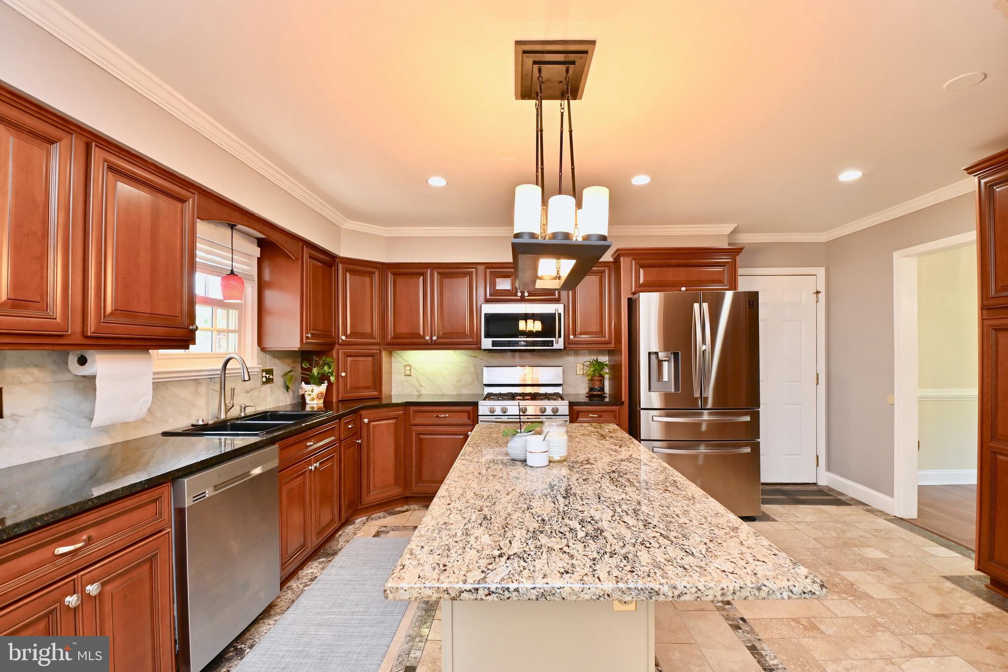 A  FABULOUS RATE PROGRAM:   2/1 Buydown   CALL FOR DETAILS TO PURCHASE THIS HOME.   Lovely dutch colonial.  It is an officially registered property, part of the Five Farms of the Mt Vernon Estate owned by George Washington.  It boasts of many upgrades and features displayed  throughout; marble foyer,  elegant  Brazilian-Cherry hardwood floors on two levels; crown molding and chair rails.  Freshly painted home and new window coverings.   GOURMET  KITCHEN with center island, Energy Star stainless appliances and granite counters.   FAMILY ROOM with recessed lighting and built in shelves.   PRIMARY ENSUITE includes fireplace,  ceiling fans,  recessed lighting, and  more.  Smartly decorated  bathrooms,  granite counters and built-ins.  An abundunce of lower level rooms;  cedar closet,  FULL bath, loads of storage.   Enclosed SUNROOM,  TRI-LEVEL PATIO,  ready for a party!  KOI/GOLDFISH POND (Koi do not convey) with WATERFALL  flowing towards the home.   Double sheds, entrance arbor and second water fountain.   OVERSIZED GARAGE  for two cars with built-ins, storage and shelving.   SIX car parking and an RV pad...  much more to see, separate list available.                                                   
PLEASE USE SHOE COVERING              Open 1:00-3:30 PM    Sunday,  11/19/23