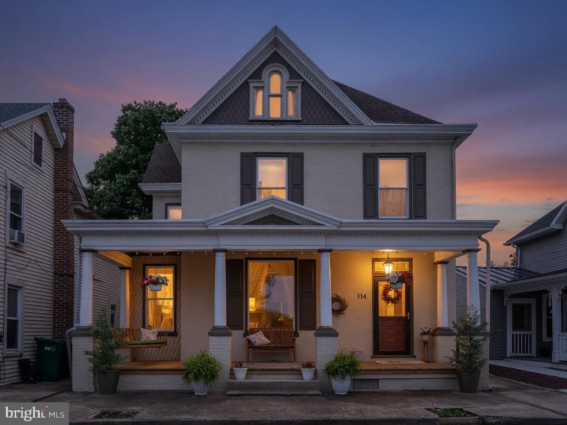 Welcome to this charming all-brick, 2½-story home nestled on a quiet street in the quaint and historic Village of Boiling Springs. Offering four spacious bedrooms, an office, and 2½ baths, this timeless residence fuses classic character with thoughtful updates. A new roof installed in 2025 provides peace of mind, while the interior showcases beautiful hardwood floors throughout the main level, elegant pocket doors, built-in cabinetry, and a cozy brick fireplace (with gas insert) that adds warmth and charm.

The updated kitchen, renovated in 2006, features granite countertops, a center island, and bar seating, creating an inviting and efficient space for everyday living and entertaining. Just beyond, the rear addition offers a relaxing retreat with a second living area and dining space complete with recessed lighting, ceiling fans, and a mini-split system for year-round comfort.

Upstairs, you'll find four generously sized bedrooms plus a dedicated office. Both full bathrooms have been tastefully updated, and the primary suite includes skylights and a spacious walk-in closet. A walk-up attic provides abundant storage or exciting potential for future finished living space.

Outside, enjoy mornings on the welcoming covered front porch overlooking peaceful Third Street or unwind on the covered rear patio overlooking the private, fenced backyard. The impressive oversized detached garage (approximately 36' x 38') offers exceptional space for vehicles, hobbies, or a workshop and is conveniently accessed from the rear alley.

Located within walking distance of everything that makes Boiling Springs so special, you'll enjoy easy access to Children's Lake, the Boiling Springs Pool, the Appalachian Trail, Allenberry, local parks and playgrounds, the school campus, and the village's scenic walking trails. Village living does not get any better! You will want to check this one out.