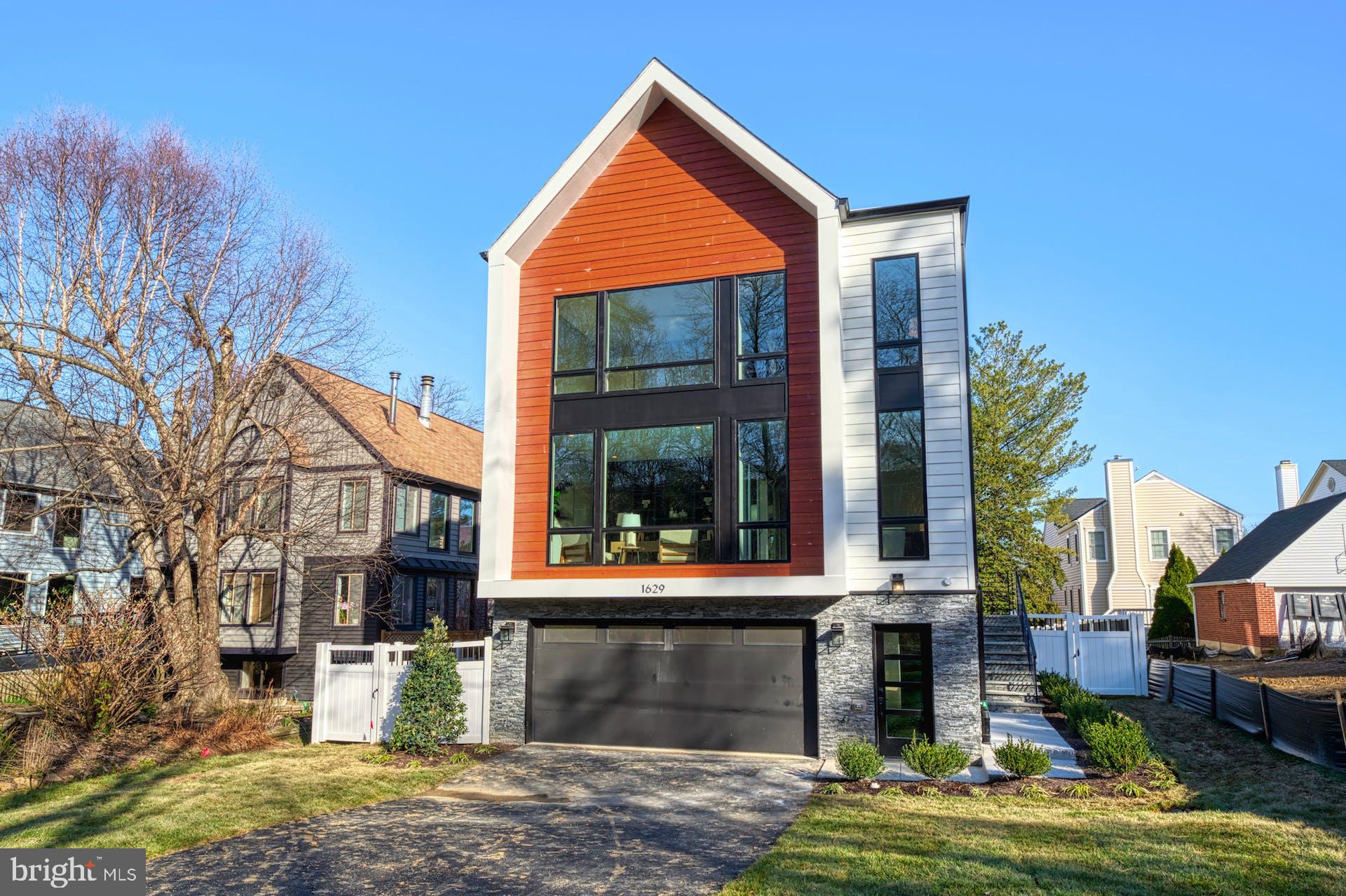 Welcome to 1629 Hunting Ave, a modern masterpiece in the heart of McLean, offering a lifestyle of unparalleled elegance and convenience. Boasting access to top-rated schools, close to everything, this new construction property is a beacon of luxury living.

Featuring 6 beds and 6 baths spread across 4,466 sqft above grade, with an additional 1,323 sqft of finished space below grade, this home exudes spaciousness and thoughtful design. The 2-car front-load garage adds to the convenience.

Upon entering, natural light floods the inviting foyer and living spaces, setting the tone for the refined atmosphere within. The formal dining room epitomizes sophistication, providing the perfect backdrop for memorable gatherings.

The heart of the home is the well-designed open kitchen, equipped with commercial-grade top-of-the-line appliances, stacked cabinetry, in/under cabinet lighting, and a spacious waterfall island with bar seating. The adjacent family room is a true spectacle, featuring a fireplace, built-ins, ceiling features, and a wall of glass overlooking the expansive maintenance-free deck.

The upper floor is thoughtfully laid out, with the primary owner's suite boasting large his and her walk-in closets, a deep soaking tub, double vanities, and a shower. Two secondary bedrooms with bath access and walk-in closets complete the upper level, each room bathed in natural light.

The lower level adds over 1,000 sqft of luxury living space, fully finished with the same quality as the main floor. An extra-wide areaway walk-out leads to the backyard, while the open floor plan includes a recreation room, designer wet bar, and a study.

For added allure, the bonus loft level offers a suite, wet bar, and a maintenance-free rooftop terrace, creating an architectural masterpiece. The property also features a Contemporary-style garage, premium Pella-450 wood windows, and more, ensuring a lifestyle of luxury and comfort. Don't miss the opportunity to make this exceptional property your new home!