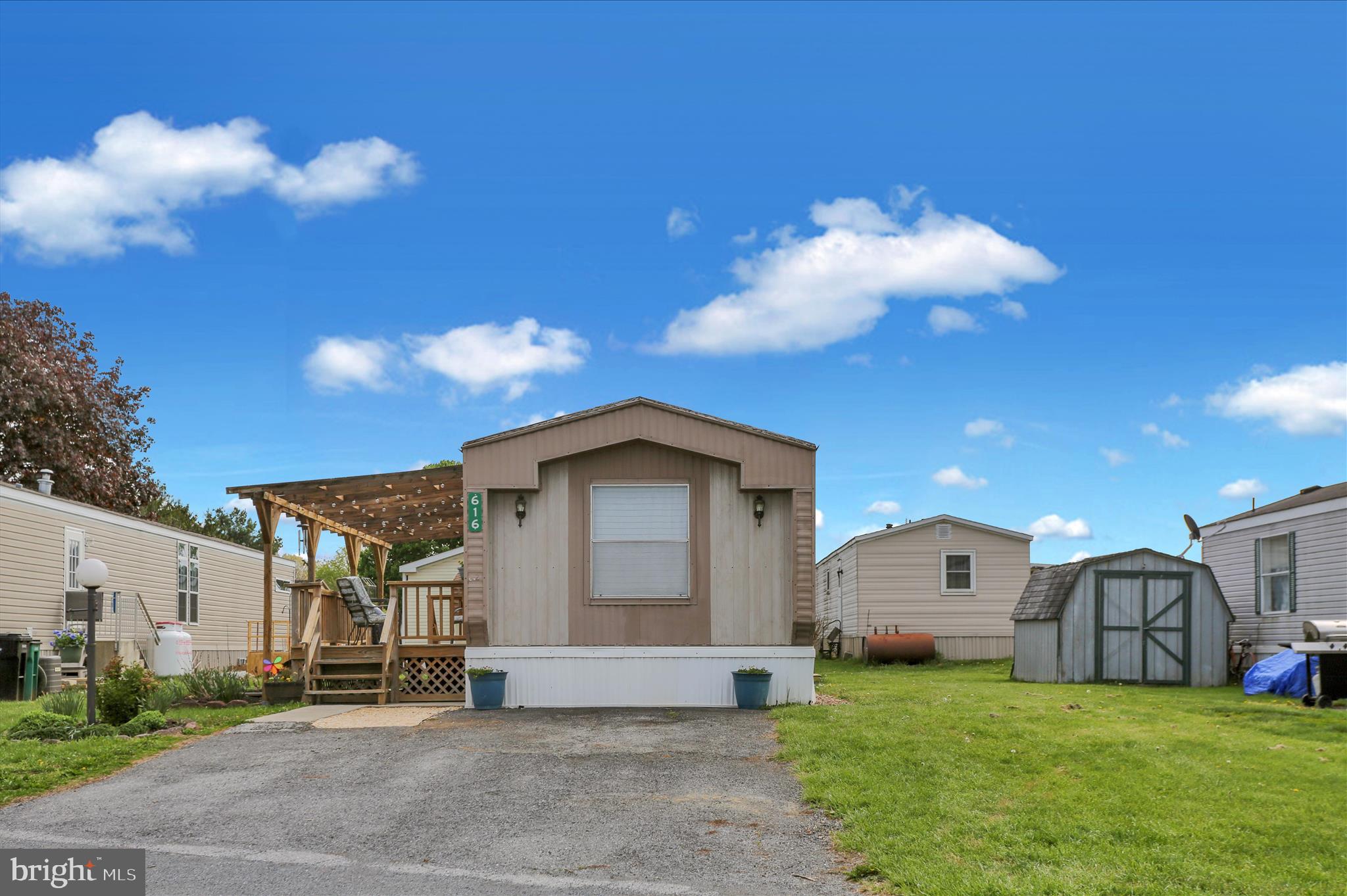 Discover the charm of this beautifully maintained 2-bedroom, 1-bathroom manufactured home in the welcoming Palm City Park community. With a major renovation just completed, this home features some new carpeting, newly remodeled kitchen, fresh painting throughout, a newer water heater and furnace, central air, and a remodeled bathroom with luxury vinyl plank flooring and a walk-in shower. 
Situated on a rented lot, this property offers a spacious asphalt driveway with room for two vehicles. Embrace the comfort and community spirit that this home has to offer!   Park approval is required.  Application fee is $60 per person.  Lot rent is $430 per month which includes trash.  Water and sewer is billed by the park and runs around $55 per month based on water usage.  There is a $2000 security deposit required after settlement when buyer signs the lease.