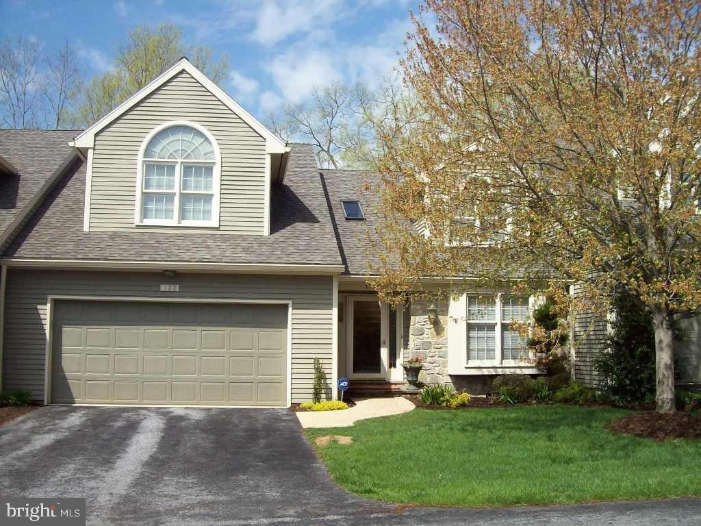 Beautifully maintained and updated home with cathedral ceilings, lots of gleaming hardwood and tile. All new master bath with walk in tile shower and whirlpool. Bright, cheerful interior. 1st floor master suite. Plenty of storage area. Propane for fireplace. Tank is rented. Jenn-Air cooktop with grill and 2 extra burners in cabinet. See docs for items for sale.
