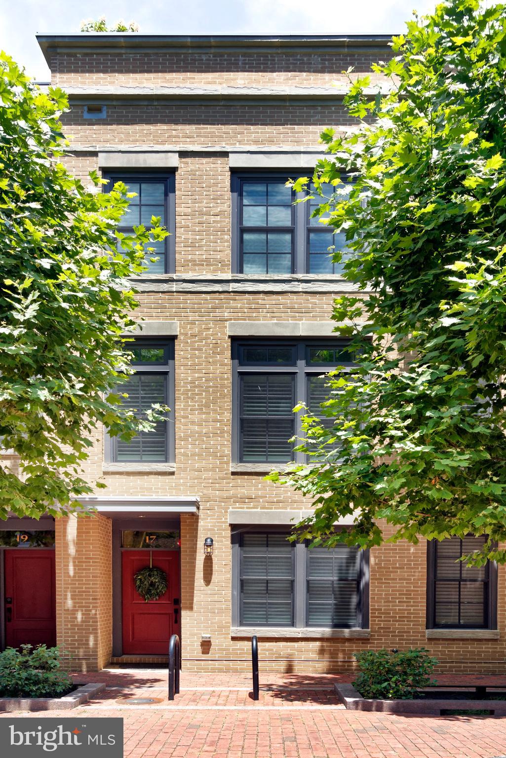 Luxury living in the sought-after Robinson Landing community. Stunning contemporary townhouse with elevator to all four levels, a river view from the rooftop deck, 4 bedrooms, 4 and one half baths, hardwood floors, high ceilings, and tall windows with abundant natural light.  The spacious living room, with a gas fireplace and custom window treatments, is a versatile space perfect for entertaining or relaxing with a book.  The dining area is light and bright next to floor-to-ceiling glass doors opening to a kitchen deck with herb planters and a gas hookup. Enjoy an elevated culinary experience in the sleek chef’s kitchen equipped with Thermador stainless appliances, gas cooking, Snaidero cabinetry, tile backsplash, quartz countertops, and a long waterfall edge island. The elegant primary suite offers two walk-in closets customized by California Closets, a fabulous spa-like bath with two sinks and two backlit mirrors plus a seamless glass shower.  Meticulous details throughout include an upper level coffee bar and beverage cooler, an outdoor sink and refrigerator on the rooftop deck plus planters with a self-watering system for flowers and ornamental grasses.  A two-car garage completes this unique home in the heart of Old Town Alexandria.  It is a close commute to DC and only 3.5 miles to Reagan airport.  Most importantly, it is walkable to many fine restaurants and shops.