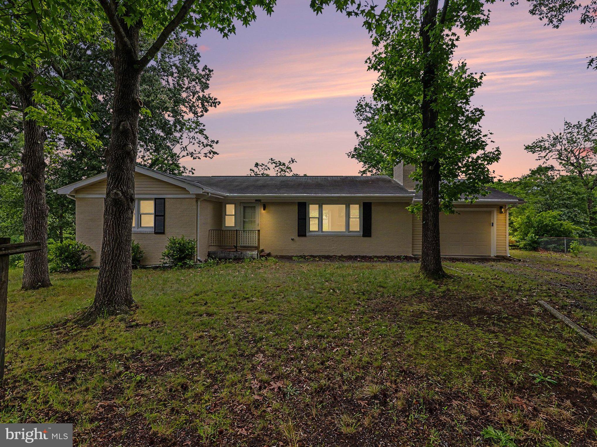 Welcome to 6223 Townsend Dr! Move in Ready 3 Bedroom 2.5 Bathroom  all brick stunning home, nestled away in the Dahlgren community with water views to the Potomac River. Fall in Love as you step inside this completely remodeled property with an open floor concept, fresh paint throughout, renovated kitchen with new cabinets, stainless steel appliances and lighting fixtures, quartz countertops, updated Bathrooms, dual vanities with mirrors features built in lights, LVP flooring in Bedrooms, as you cozy up to the brick fireplace. 
New HVAC unit ( 2025), New Deck, 1 Car Garage. Enjoy the private backyard and the serene nature scenery. Large size lot, quiet area that is perfect for walking offering tranquility and accessibility to many local shops and restaurants.  Located within walking distance to NSWC, minutes from the Maryland Bridge.  Schedule your private tour today!