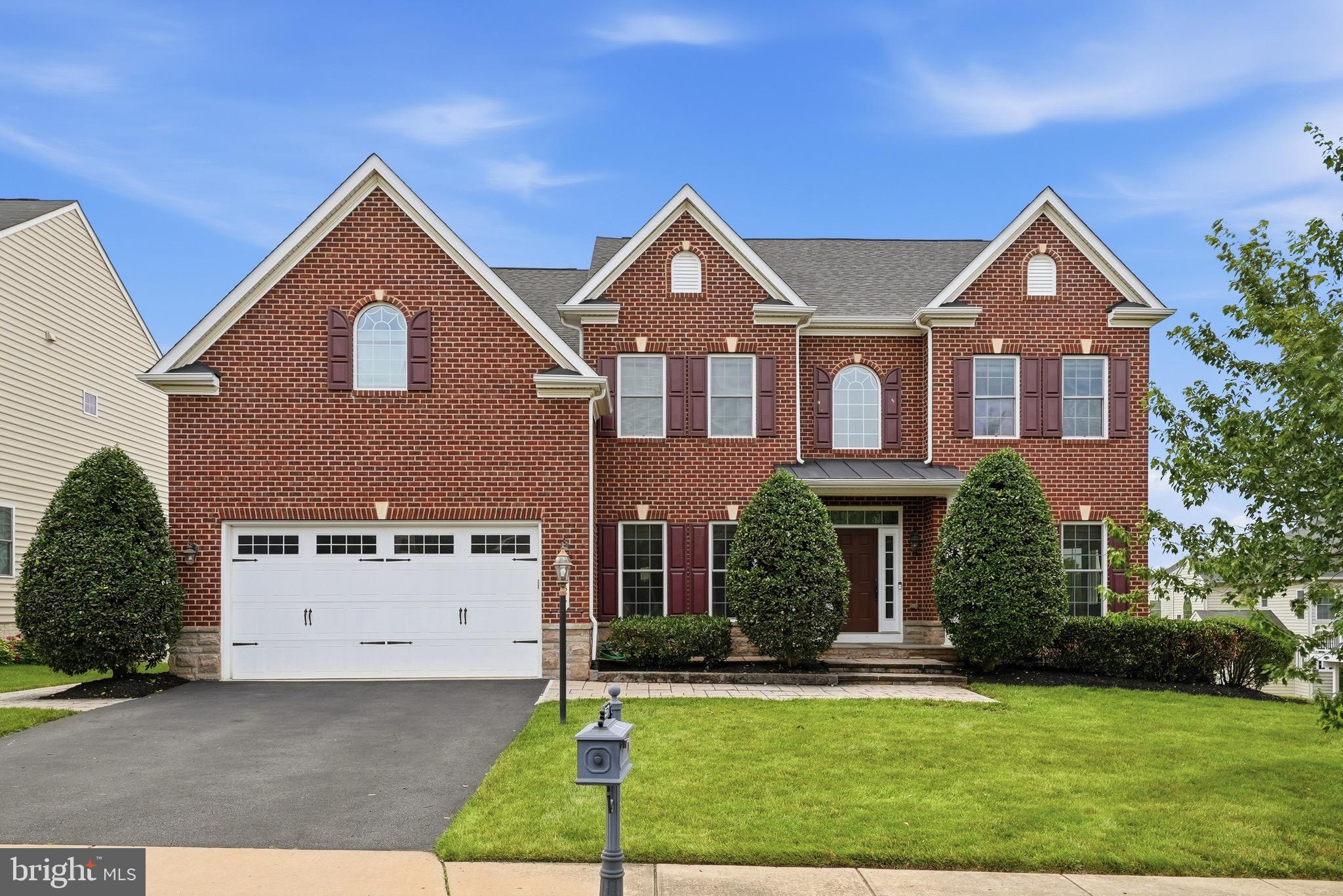Introducing the former NV MODEL HOME in the highly desirable Seven Hills section of VIRGINIA MANOR—an exceptional Colonial-style home offering 5,908 FINISHED SQUARE FEET across FOUR LEVELS. Lovingly maintained by its original owners, this elegant home blends timeless design with modern comfort in one of Loudoun County's most sought-after communities.
Step inside the impressive two-story foyer, where you'll immediately appreciate the FRESH PAINT THROUGHOUT AND HARDWOOD FLOORING ACROSS EVERY LEVEL. The thoughtfully designed floor plan offers FIVE SPACIOUS BEDROOMS, including a PRIVATE TOP FLOOR SUITE, and FIVE-AND-A -HALF BATHROOMS, providing flexibility for today's lifestyle.
Designed for both everyday living and effortless entertaining, the main level features a WELCOMING FAMILY ROOM that flows seamlessly into the sun-filled breakfast area and an expansive gourmet kitchen. Complete with granite countertops, TWO DOUBLE OVENS, staineless steel appliances, abundant cabinetry, generous prep space, and a walk-in pantry, the KITCHEN IS FUNCTIONAL AS IT IS BEAUTIFUL.
The FULLY FINISHED WALK-OUT LOWER LEVEL is an entertainer's dream, featuring a dedicated theatre room, wet bar, addional dishwasher, full bathroom, versatile flex room ideal for a home office, gym, or hobby space, and an EXPANSIVE RECREATION ROOM with a built-in sound system—perfect for hosting family and friends.
Outdoor living is just as inviting, with a low-maintenance deck overlooking a beautifully landscaped, tree-lined backyard. Enjoy evenings around the custom stone patio and fire pit, while the underground irrigation system helps keep the landscaping looking its best.
RESIDENTS OF VIRGINIA MANOR ENJOY access to  RESORT STYLE AMENITIES, including pools, community centers, playgrounds, basketball and tenniss courts, fitness center/gym, and scenic walking trails. Conveniently located near major commuter routes, shopping, dining, local wineries, and highly regarded Loudoun County schools, this home offers an exceptional combination of luxury, comfort, and convenience — READY TO WELCOME ITS NEW OWNERS.