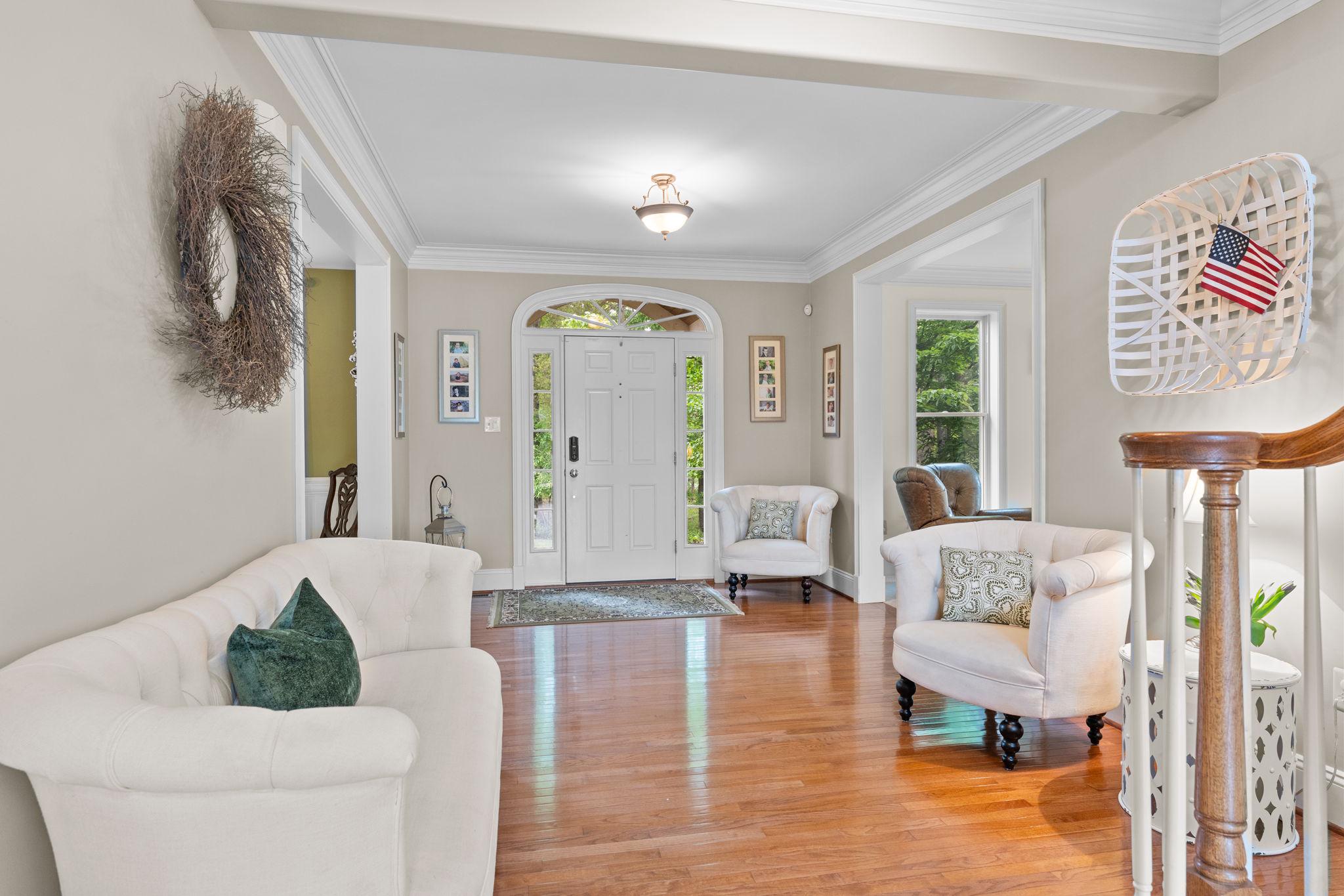 Welcome HOME to 912 Ashbourne Way!  Offered at a new price and nestled in the highly sought-after Ashbourne Estates, this stunning Colonial blends luxury, comfort, and everyday livability across more than 4,400 square feet of beautifully designed space. From the moment you step into the grand foyer, the home feels warm, welcoming, and made for both entertaining the most sophisticated events to everyday relaxing and enjoyment.  
The dining room is perfect for hosting gatherings, featuring a gorgeous tray ceiling and a full butler’s pantry with a wet bar and dishwasher for added convenience. The gourmet kitchen is truly the heart of the home, complete with high-end appliances, a commercial-grade side-by-side oven, a striking dark copper hood, and an abundance of granite countertop space. The oversized two-tier island makes entertaining effortless while still being ideal for everyday meals.
The open floor plan flows seamlessly into the spacious family room and expansive casual dining area designed to comfortably accomodate large gatherings and everyday living.  Surrounded with views of the open yard and in proximity to the kitchen so the chef never misses out on the conversation. The family room features brand-new carpet and a beautiful natural stone fireplace that creates the perfect cozy atmosphere. Looking for a quieter retreat? The formal living room offers oversized windows with private, peaceful wooded views. Just off the living room is a fifth bedroom with its own bath, making it an ideal setup for an in-law suite or private guest suite.  
Upstairs, you’ll find four more generously sized bedrooms, including an incredible primary suite designed to feel like a true retreat. Enjoy a large sitting room, two separate walk-in closets, and a luxurious primary bath featuring two private commodes, a dual entry shower, built-in vanity, and a soaking tub all surrounded by tons of natural light. Two additional bedrooms share a Jack and Jill bathroom while  overlooking the expansive backyard.  The 4th bedroom is such a unique delight boasting a hand crafted coastal mural in it's generous space while also containing its own private full bath.
Need even more room? The finished bonus room over the garage offers endless possibilities and even has room to add another full bathroom for an additional en suite. The sizeable upstairs laundry room adds convenience with extra storage and countertop space. A rear staircase leads down to the mudroom, complete with built-ins, two closets, and a second powder room with easy access to the garage, kitchen or the front of the home. 
The unfinished basement offers an incredible amount of storage and plenty of flexibility for a future gym, hobby room, or finished living space customized to your prefrences. 
Outside, the 1.84-acre lot provides a private, serene setting with a flat backyard perfect for entertaining, play, or simply relaxing. Enjoy evenings on the expansive paver patio or unwind in the hot tub while taking in the peaceful backyard oasis. Utilize the pole barn shed for the exterior maintenence items and leave the 3 car garage for parking your vehicles!  The long driveway provides ample parking and a great space for outdoor basketball! No need to worry about big ticket items.  This home has had a new roof, new garage doors, new grinder pump and a new water heater all in the last few years.  912 Ashbourne truly offers the perfect blend of luxury and comfort, with thoughtful details and versatile spaces throughout. Make it your new home today!
OPEN HOUSES THURSDAY AND SATURDAY WITH PRIVATE SHOWINGS AFTER 2PM ON SATURDAY 5/16.