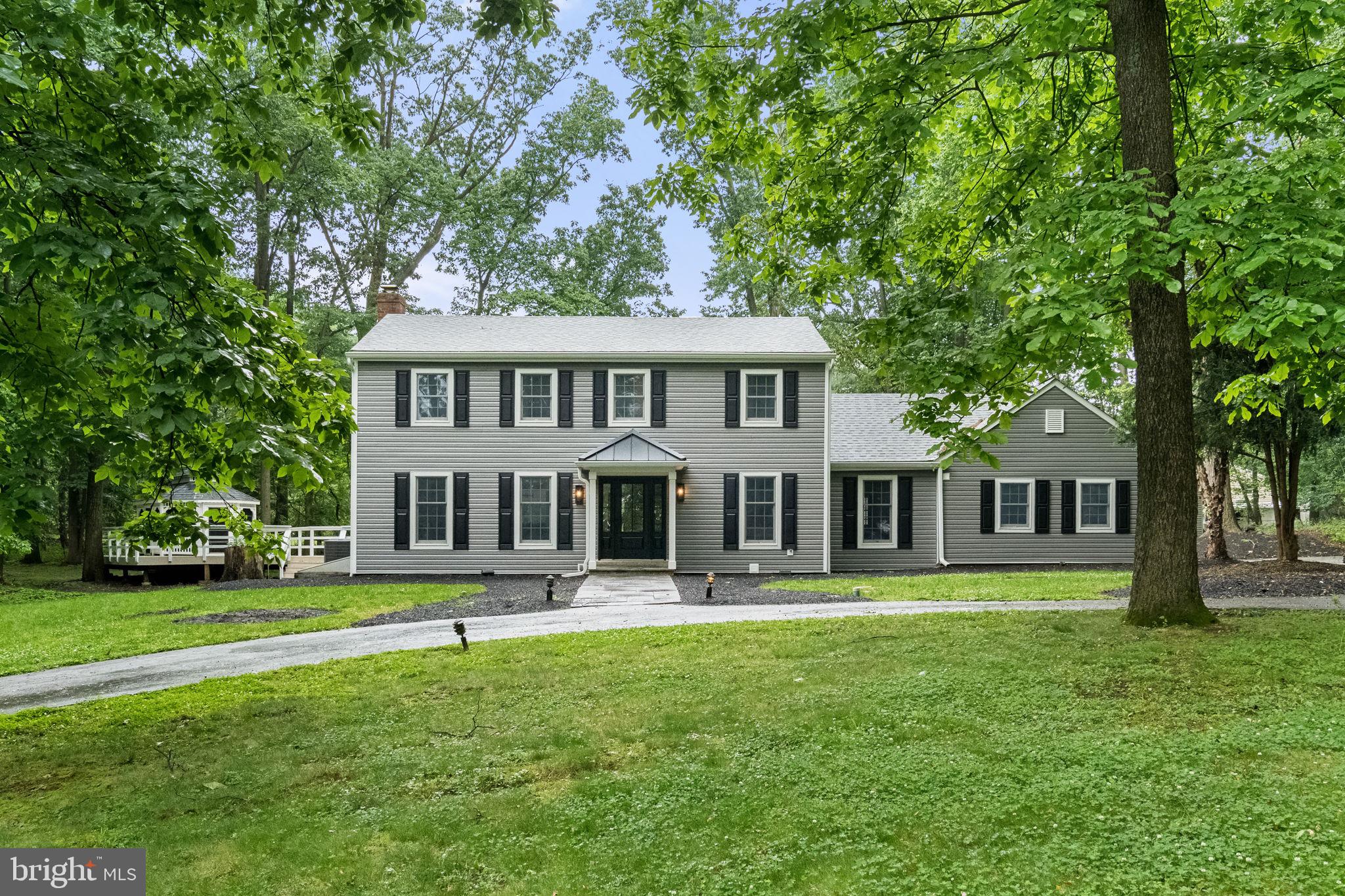 Welcome to 1105 Tinkerhill Lane, a stunning top-to-bottom renovation set on a breathtaking 2.3-acre flat lot in the heart of Malvern. Completely transformed inside and out with exceptional attention to detail, this move-in ready home seamlessly blends timeless style with modern luxury.

A circular driveway and extended 3-car garage create an impressive arrival experience, while the expansive grounds provide privacy, beauty, and endless outdoor enjoyment. Just off the garage, you’ll find a thoughtfully designed mudroom, powder room, and pantry area that add both convenience and functionality to everyday living.

At the heart of the home is the spectacular chef’s kitchen, featuring high-end appliances, a large center island, and abundant cabinetry, all opening seamlessly to the spacious family room. Oversized windows and open sightlines showcase the picturesque property and fill the home with natural light, creating the perfect setting for entertaining and comfortable daily living.

The second floor offers four generously sized bedrooms and two beautifully updated bathrooms, along with ample closet space throughout. Every room has been carefully renovated to deliver both style and comfort.

The outdoor amenities are equally impressive, highlighted by a detached oversized storage shed and a separate enclosed gazebo — ideal for relaxing, entertaining, or enjoying the peaceful surroundings year-round.

This exceptional property offers the rare combination of a completely renovated home, expansive flat acreage, and a premier Malvern location.