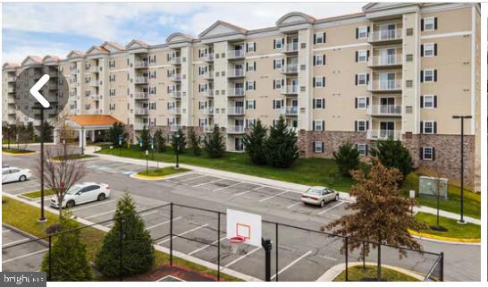 Convenient access to shopping, dining, entertainment as well to interstate 95, 395, and 495. Shuttle bus to metro, Pentagon & Ft Belvoir bus service. Estimate 12 miles from DC. 
Lovely building with garage parking, large pool, lounge & cabana. Privat dog park, 1/4 mi fitness path,
Fitness/exercise room, outdoor sports court. Gas heat & hot water. Full size washer & dryer.
All the features you expect in an upscale property, SS appliances, granite counter tops, ceiling fans, tray ceilings in bedrooms + 9-foot ceilings throughout, wood floors. This property is maintained and managed well.  Bike rack in garage.  Patio and a small storage area next to patio.    Owners also have access to the pool and pickleball courts across the street 

www.isbellacondos.net for more information and pictures