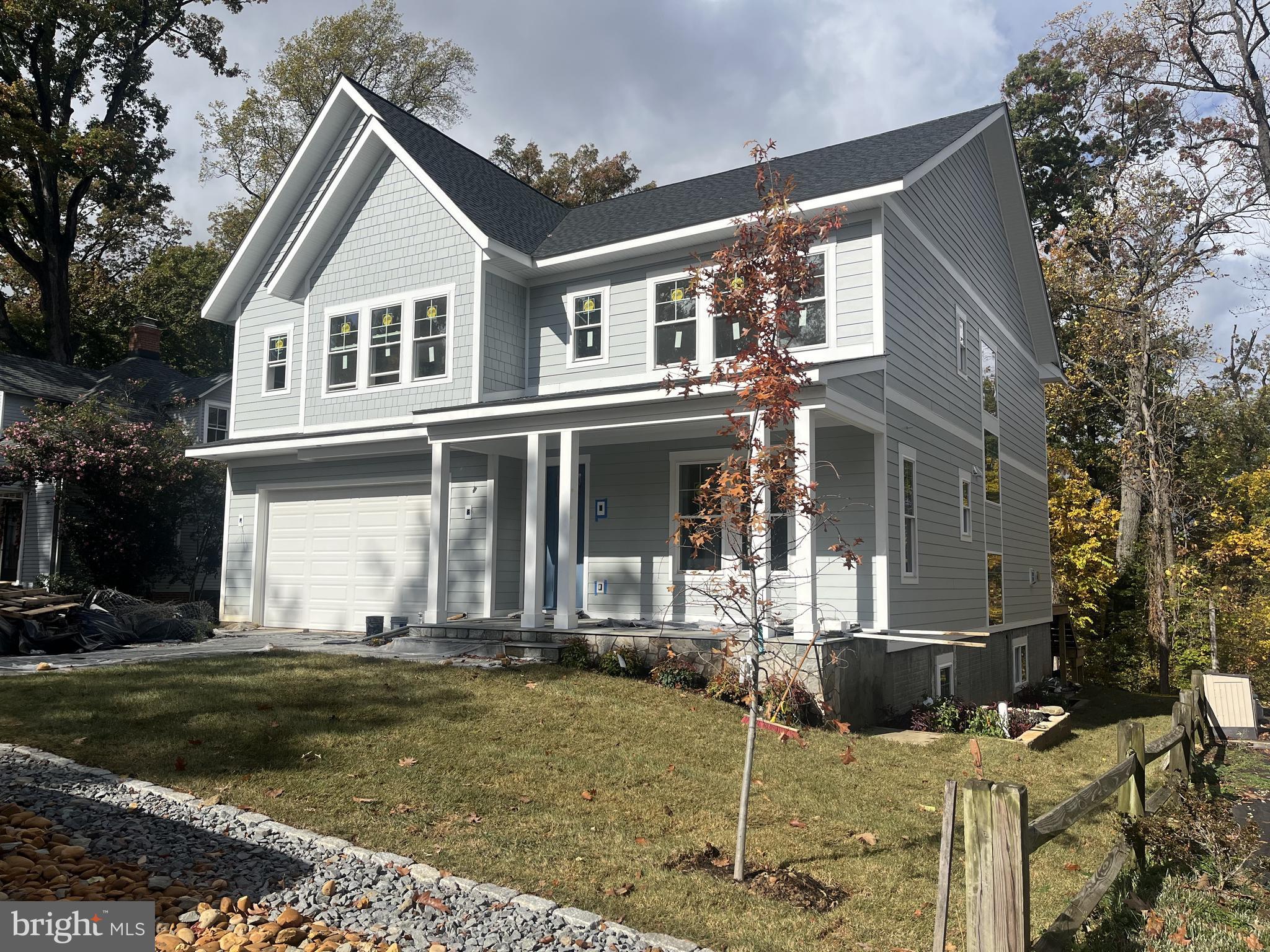 **A&N Homes presents another well  built  home in the historic  Glen Carlin  neighborhood that backs to park. **Built with quality:  Pella Low E double pane windows; GAF architectural shingle roof; HardiPlank siding, stone water table at front, flagstone walkway and front porch flood; most of exterior trim is wrap with one inch PVC for low maintenance**two zone HVAC with gas furnace for main and lower levels and electric heat pump for upper level; 75 gallon side vent gas water heater; two 200 Amp electric panel boxes; rapid charge car charger**extensive insulation; tongue-in-groove wood floors in natural finished on main and upper levels,, LPV extra thick flooring in lower level**The family room,  dining area, and kitchen span the back of the home with a screened porch and deck providing tranquil  views**A gas fireplace is the focal point of the family room with high ceilings and multiple windows with pretty views and a sliding door the screened porch and deck**The kitchen features Shrock "Entra" cabinets, solid surface countertops,  Thermador gas range and two dishwashers; Zephyr rangehood; KitchenAid refrigerator, and Sharp under-the-counter-microwave**With an adjoining bathroom, the main level den can be used  as an office or occasional guest space**Upstairs, the primary suite offers two  fitted,  walk-in closets and  a primary bath featuring a soaking tub, large shower, and double sink vanity**Three more bedrooms are on this level and each has a private bathroom**There is a linen closet in the hall with additional storage in the laundry room**The  lower level has large windows and a door to the side yard. The big rec room has areas for media, game tables, and workout space. **The fifth bedroom and bathroom are tucked away in a private corner--ideal for an in-law,  au pair,  or long term guest** The Glen Carlin  neighborhood ends at the 94 acre park  with hiking trails, picnic area, playground, and pet areas.  An Arlington County library and community garden is in the area along with Carlin Hall and the Ball-Sellers House, the oldest residence in Arlington**
Easy access to Washington, government,  military and business centers, National Airport, Tysons, Dulles Airport and Tech  Center**