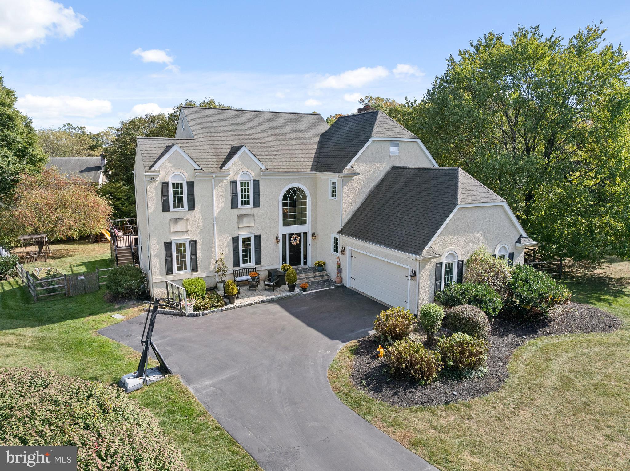 Welcome to 7 Fieldstone Lane, a stunning residence nestled at the top of a peaceful cul-de-sac in Bryn Mawr, offering the perfect blend of modern luxury, convenience, and tranquility. This thoughtfully enhanced 5-bedroom, 4.1-bathroom home is a rare gem in one of the most desirable neighborhoods just minutes from shopping, dining, and prestigious schools.

As you enter, the grand two-story foyer sets the tone for the scale of this luxurious residence. Natural light warms the main floor, punctuated with Mercier Maple hardwood flooring throughout. An inviting family room, brightened by windows on two exposures and featuring a wood-burning fireplace accented by a wall of custom marble, flows effortlessly into the heart of the house - an expansive gourmet kitchen, equipped with high-end Miele appliances, including a plumbed coffee maker, two ovens, two dishwashers, and four refrigeration options. A coffee bar, informal dining area, and a newly established pantry provide daily comfort and convenience. The custom Omega cabinetry, marble brick back splash, quartzite countertops, and ample natural light make this space a true culinary haven, ideal for both intimate family gatherings and grand entertaining. The kitchen also features two entryways onto the newly built Trex-style deck with a PDC Synergy Swim Spa, providing the perfect space for relaxation and fitness while contributing to the home's healthy lifestyle appeal. A large, private yard with a swing set and garden seating area, offers an ideal backdrop for entertaining or peaceful reflection. An elegant dining room, spacious laundry, and two office spaces complete the spectacular main level. 

Upstairs, an open landing with brilliant hardwood sets the stage for four spacious bedrooms. The luxurious primary suite boasts an upgraded spa-like bath with freestanding tub, custom vanity, tiled shower with pebble flooring, and expanded closet space - a serene owners retreat. Two additional bedrooms share an upgraded hall bathroom with new vanity, while a fourth bedroom with en-suite bathroom finishes the second level.

The expansive basement is a versatile haven for relaxation and recreation. Whether you’re enjoying a movie in the TV area with elevated platform seating, challenging friends to a game of ping-pong or air hockey, or getting in a workout, this space is designed for both fun and functionality. The convenience of a full bath, separate exercise room or bedroom,  and kitchenette make it a perfect extension of the home’s living area, ideal for hosting guests or indulging in some downtime.

Every detail in this home has been thoughtfully designed and meticulously maintained, from upgraded lighting and electrical systems to an advanced security system, ensuring peace of mind. Located just 5 to 10 minutes from everything you need, this home offers the best of suburban living while being within easy reach of the vibrant culture of Philadelphia. Whether you're drawn to the elegant design, the unparalleled convenience, or the serene surroundings, 7 Fieldstone Lane is ready to welcome you home.