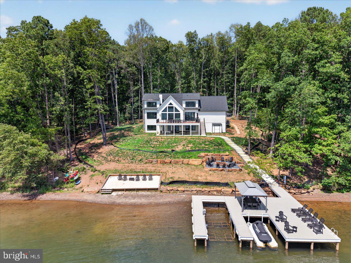 Brand New non subdivision 5 bedroom home on the Private side of Lake Anna. Master on the main floor with 4 junior suites. Has a 1 year rental history on the books.
This 5 bedroom 5 and 1/2 bath was designed for retirement, vacation or Short Term Rental. Incredible views from all bedrooms, over 150 feet of waterfront, amazing dock area, real rock fire pit and soooo much more!
dont hesitate or risk missing out on an perfect Lake Anna home!

CALL AGENT FOR SHOWINGS TIMES HOME IS A SHORT TERM RENTAL