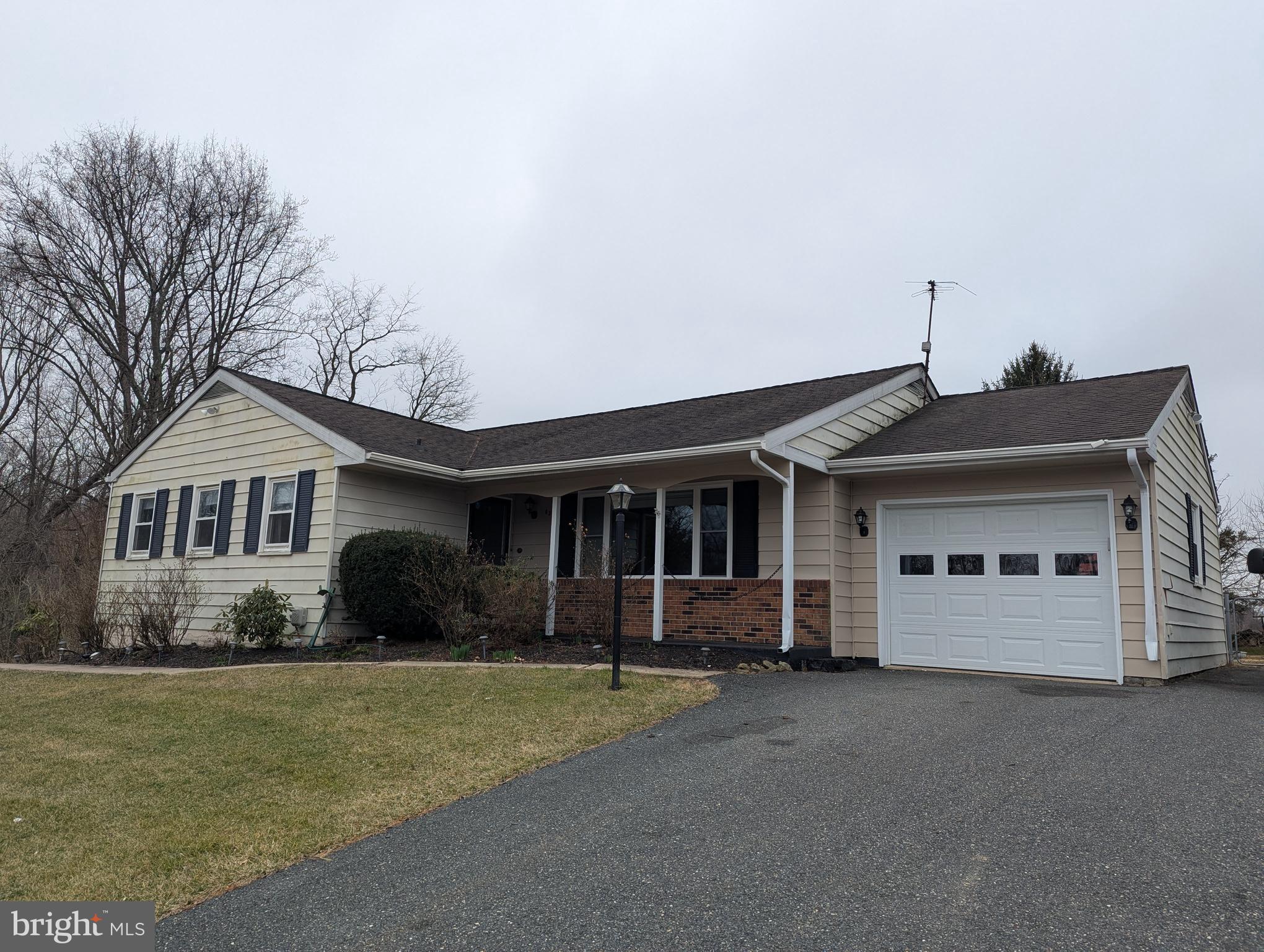 $300,000 LIST PRICE SUGGESTED OPENING BID AT AUCTION. ****NO PRE BID**** AUCTION FRI, April 11, 2025 @ 11:00 AM ON PREMISES. Large private lot at end of Camelot Drive backs to open space. 
 Walk into entry foyer w/ wood like laminate floors. Formal dining room. Crown molding & chair railing. Updated kitchen w/ granite counters, tile backsplash, plenty of cabinetry, breakfast island, LG gas stove, microwave, dishwasher, side by side refrigerator, recess lighting, pantry area, and exit to 1-car garage. (Freezer in garage is excluded from sale). Family room (new addition) w/ exit to stone patio. Digital thermostat. Sunporch area w/ ceiling fan, tile flooring, & sliding doors to outside w/ Trek deck. Whole house fan. Full bathroom in hallway. Bedroom #1 w/ closet. Bedroom #2 w/ closet. Hallway closets. Bedroom #3 (primary) w/ closets. Full bathroom. Lower level has utility room w/ new heat & air for main house area, washer & dryer, utility sink, gas hot water. Finished clubroom. French doors exit to outside. Office room. 2 nd utility room. Bedroom #4 or additional office. Bathroom #3. Working hot tub and pool table included in sale. Public water/ private septic.