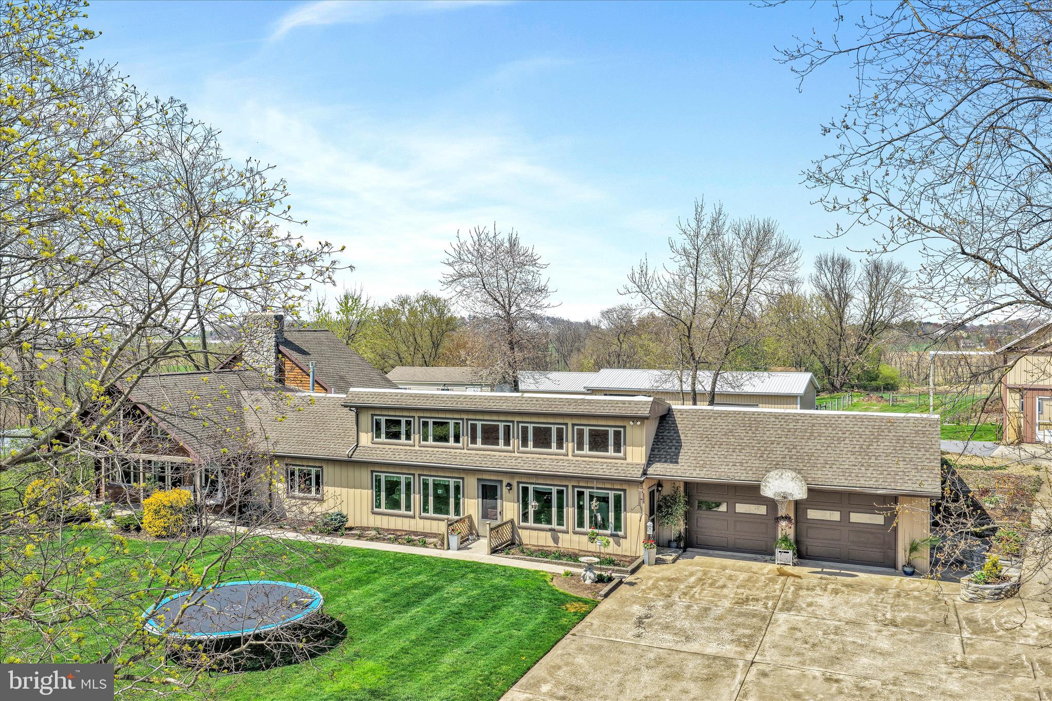 Public Auction Friday June 5, 2026 @ 5PM. Open House Saturdays May 16 & 23 from 1-3PM. Buyer required a 10% non-refundable deposit. Settlement within 45 days. Buyer pays the 2% Real Estate Transfer Tax. List price does not reflect the final sales price. ** Schaefferstown/Furnace Hills Area Earth Berm 3244 SF Ranch Home on 3.14 Acres. It features a Country Decor with an open floor plan of an Eat-In Kitchen & Living Room w/Vaulted Ceilings & Exposed Beams. 4 Bedrooms, 3 Full Baths, Office, Canning Room. The Log Addition features the primary bedroom with a Stone Fireplace & Gas Stove Insert, highlighted byba cathedral ceiling, Walk-In Closet, Full Bath w/Dbl Bowl Vanity, The Upper Level is a finished BR/Rec Room, CA, Radiant Oil Hot Water Heat is also set up to use sawdust as fuel, making it very cost effective. Attached 2 Car Oversized Garage w/9' Ceilings & 8x10 Garage Doors. Outbuildings: 24x88 Implement Shed/Barn with 1-14'H & 1-10'H Overhead Door, Elec & Water. 20x31 2 Sty Shed w/elec & water. At the rear of the property is a 12x20 Shanty w/elec & woodstove. Lots of Macadam Parking. Approx 1.5 Acres of Fenced Pasture. This unique country property has a lot to offer with an efficient and spacious home, outbuildings and over 3 acres, making this ideal for the family. Proximity to Routes 501 & 897.