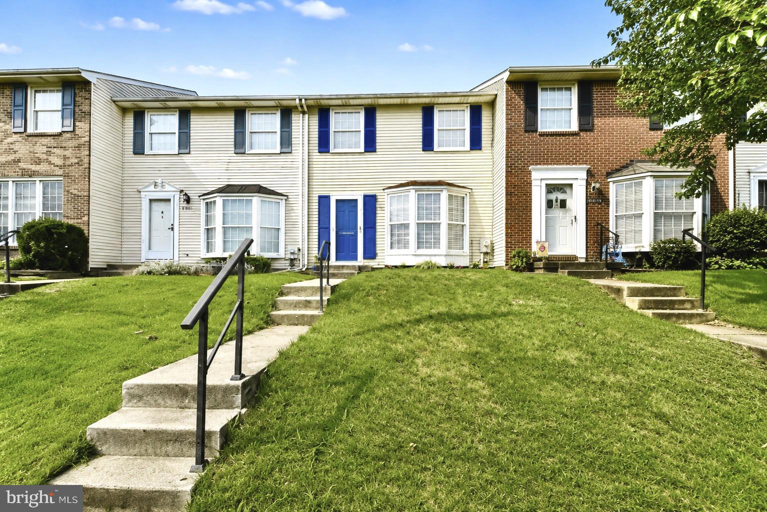 Welcome to 9121 Deviation Road! This move-in ready, beautifully maintained 3-bedroom, 2.5-bath townhome is ready to welcome its next owner. From the brand-new carpet to the freshly mulched flower beds, you'll appreciate the care and pride of ownership throughout. The main level offers a traditional floor plan featuring a spacious living room, separate dining room, and an eat-in kitchen. Upstairs, you'll find a generously sized primary suite with a beautifully updated private bath, along with two additional spacious bedrooms and an updated hall bathroom. The finished walk-out lower level provides additional living space with a large family room featuring a cozy wood-burning fireplace with a new firebox and brick completed in 2025. The lower level also includes an updated half bath and a utility/laundry room with ample storage. An abundance of attic storage offers even more space for seasonal items and belongings. Enjoy the peaceful backyard setting that backs to open space, providing added privacy and a relaxing view. Conveniently located near shopping, dining, parks, and major commuter routes, this home offers the perfect combination of comfort, convenience, and value. Don't miss your opportunity to make this wonderful home your own! Home is Where Your Story Begins!