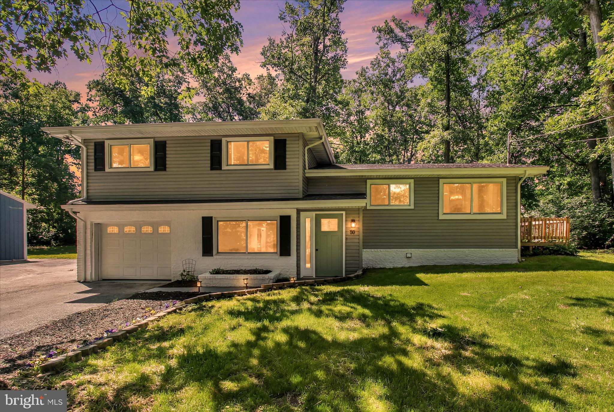 Welcome home to this newly remodeled home in the sought after gated community of Lake Meade.  This residence sits on a Double Lot with a 45ft  x 24 ft building.  The open concept Floor Plan with Large Renewal by Anderson windows is great for entertaining.  Off the Kitchen is a large deck that allows you to bring the party outdoors.  The Kitchen Features New Appliances, soft close cabinets and large Island with granite countertops, new flooring throughout and completely painted.
Upstairs you will find Three generous bedrooms with Two full baths. 
The first level is a Family Room, Recreation Room, Laundry Room tucked in the corner.  There is a Half Bath adding to your convenience there is also a One Car Garage on this level.  
The Pole Building features a poured concrete floor, a subpanel, and a half bath.  Features include a 16 ft Wide Door, Loft Ceiling with an automatic Garage Door.  
The large Back Yard is an Oasis for entertaining.  The oversized Patio with Gazebo has a large Fire Pit.  The large Playset stays with property.
Numberous upgrades such as a 200 Amp service,  22 Seer Heat Pump, two laundry areas 2nd Washer and Dryer Downstairs, new Lightings, Landscaping are just a few of the many Features of this lovely home.  There is also an unfinished basement that has a Chest Freezer.  Don't miss this wonderful property!!!!
