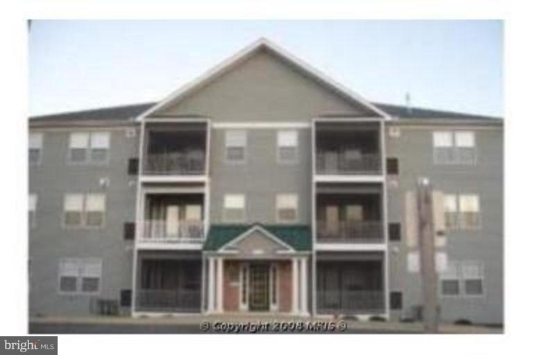 Two bedroom two bath condo with fireplace,hardwood floors and granite counters! Get in and enjoy your screened in deck, community pool, tennis, playgrounds and walking paths. Located in a secure gated community with locked main entry door and intercom access for guests.