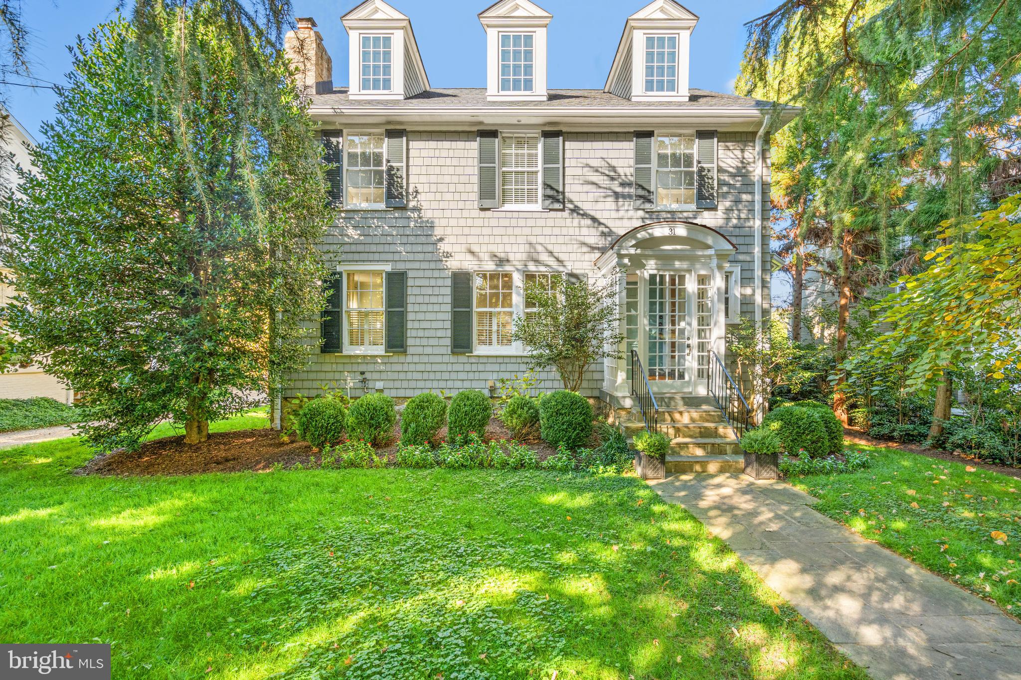 Welcome to 31 Quincy Street, a beautiful home suited for entertaining in an idyllic setting on one of the prettiest streets in Chevy Chase Village.  Newly renovated in 2014 with a grand, 3-story addition including spacious family room, large primary bedroom and primary bathroom with his and hers walk-in closets and a huge, walk-out lower level that was dug out to bring in light and high ceilings.

The main level includes a front vestibule, gracious entry area with powder room, stunning living room with fireplace, separate dining room, renovated kitchen, breakfast room opening to deck overlooking backyard and family room with built-ins.

The upper level includes the fabulous primary suite, a home office/bedroom off the hallway, laundry and two wonderful bedrooms with a shared bathroom.

The light-filled third floor is a bonus bedroom, recreation room or home office with a full bathroom.

The walk-out, lower level is very usable compared to other Village basements, and it has an open space suitable for a home gym, storage, a spacious bedroom with an adjoining bathroom, mudroom and a light-filled office or recreation room with built-in bookcases and cabinets.  

The exterior amenities are highly desirable and include cedar shingles and roof from the 2014 renovation, mature landscaping that provides privacy and year-round blooms, underground sprinkler system, fully-fenced backyard, play set (conveys) and detached garage suitable for a car, work out room or a possible conversion into a guest oasis.

With wonderful natural light in abundance, the property conveys with custom drapery, window treatments, light fixtures and built ins.

Chevy Chase Village offers the masterpiece of local services with a Village Hall, government offices, police force that will collect your newspapers and check on your house while you are away and trash (twice weekly) and recycling collection pickups behind your house or wherever you place it.

With a private feel and quiet neighborhood, this property is near so many amenities, from the market, café, pharmacy and dry cleaner on Brookville Road to the shopping along upper Connecticut Avenue and Bethesda, the Friendship Heights Metro and nature trails in Rock Creek Park.  It’s also a convenient drive to the region’s three international airports.