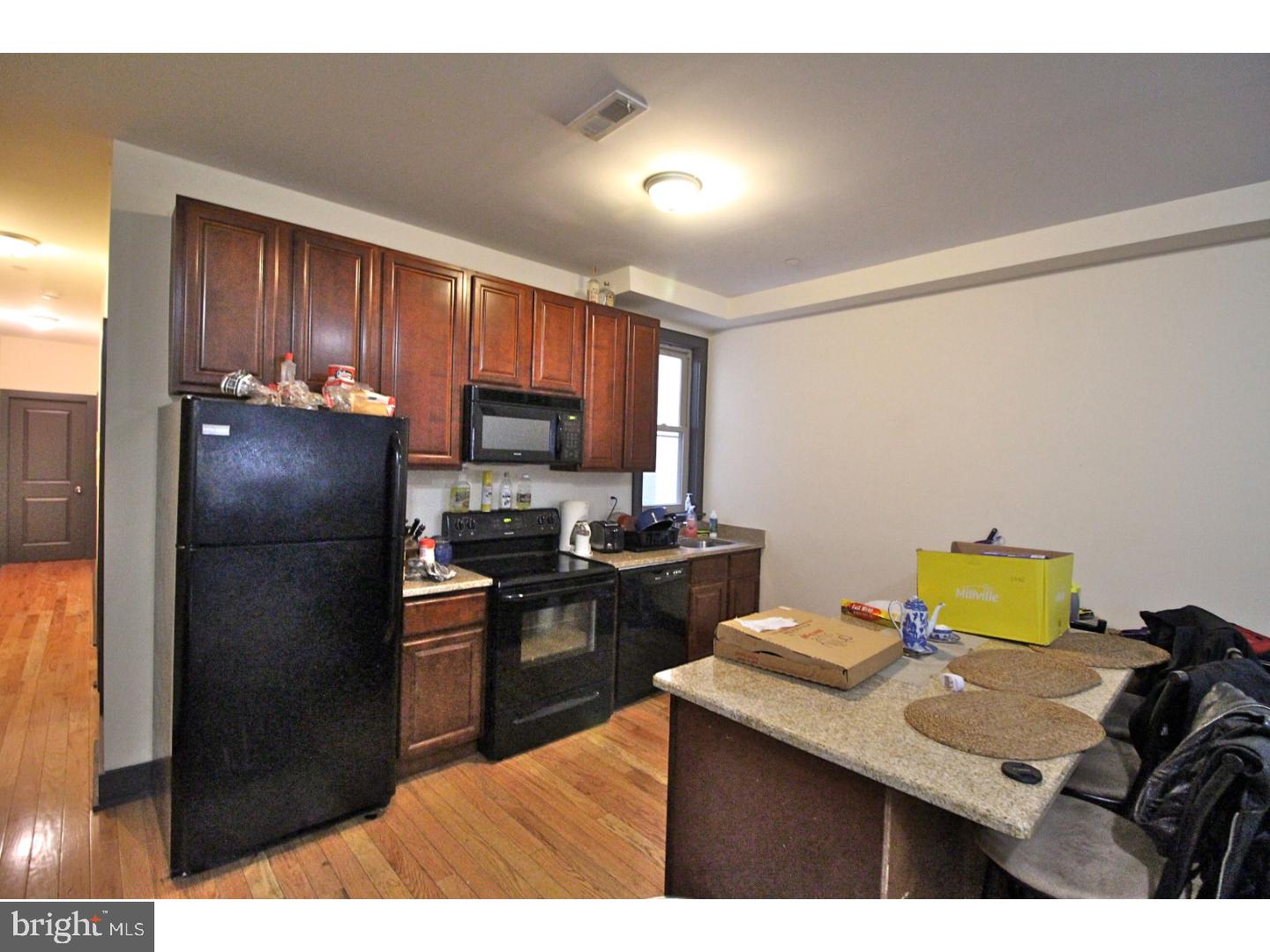 Large 6BR 4BA available for fall semester. Modern apartment with Hardwoods, central a/c and heat, in unit laundry and back patio ! Enter this unit on the second floor which enters into a large open living room. Kitchen is also on this level and has granite counters and island, black appliances including dishwasher and garbage disposal. The living room is spacious and open and has ample natural light. Close to the heart of campus and broad St!