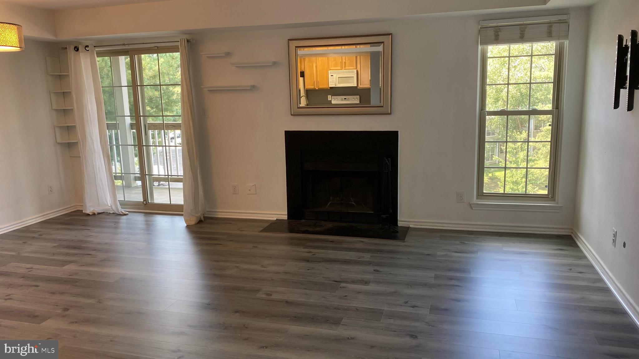 Spacious, move-in ready,  2 bed/2 bath over 1000 sq. ft condo  on  3rd floor in sought after Penderbrook Square community. Recently installed beautiful flooring.  Large and beautiful kitchen with island and pantry. Siding door to a spacious and newly renovated balcony with an extra storage closet. Community amenities 
are included in rent, including water, trash removal, pools, gyms, basketball/tennis courts, and reduced fees for using  golf course. Minutes of drive to Fair Oaks Mall, Fairfax Towne Center, Fairfax Corner.  Easy access to US 50 and I-66. One assigned parking and ample visitor parking near the building.