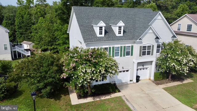 Former model home in Orchid Park of Wildewood. 3 bedroom, 3.5-bath end unit that has been well maintained and thoughtfully updated throughout.  Inside, the home has gleaming hardwood floors throughout the first floor, new carpet upstairs (2024), and fresh paint colors...giving it a bright, move-in-ready feel from the moment you walk through the door. The major updates buyers look for have already been taken care of: new kitchen appliances (2024), a new roof (2024), and a new HVAC system (2021). With the big-ticket items done and thoughtful details throughout, this end-unit home offers the rare combination of privacy, updates, and community amenities all in one place. The finished walk-out basement offers valuable additional living space and could easily serve as a 4th bedroom suite with full bath and walk-in closet! It's also perfect for a rec room, home office, or guest suite, while the 1-car garage adds everyday convenience. Step outside to the brand-new deck (2024), where the backyard backs to trees, a rare find in a townhome community. The yard has built-in lawn irrigation system and  the home is located within easy walking distance to the community pool.