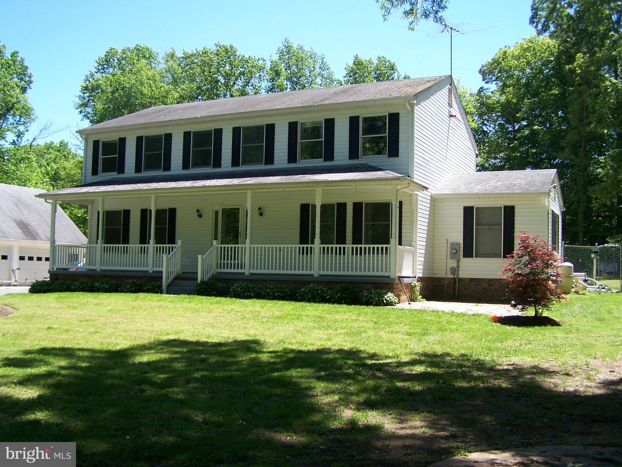 If you're looking for privacy for outdoor entertaining, this could be the home for you! 5 Bedroom 2 and a half bath colonial home is situated on a quiet 1 acre lot that backs to woods.  Home features an in-ground pool, jacuzzi, and tiki bar that are perfect for your summer cookouts. There is a detached 2 car garage, and 4 storage sheds on the property.