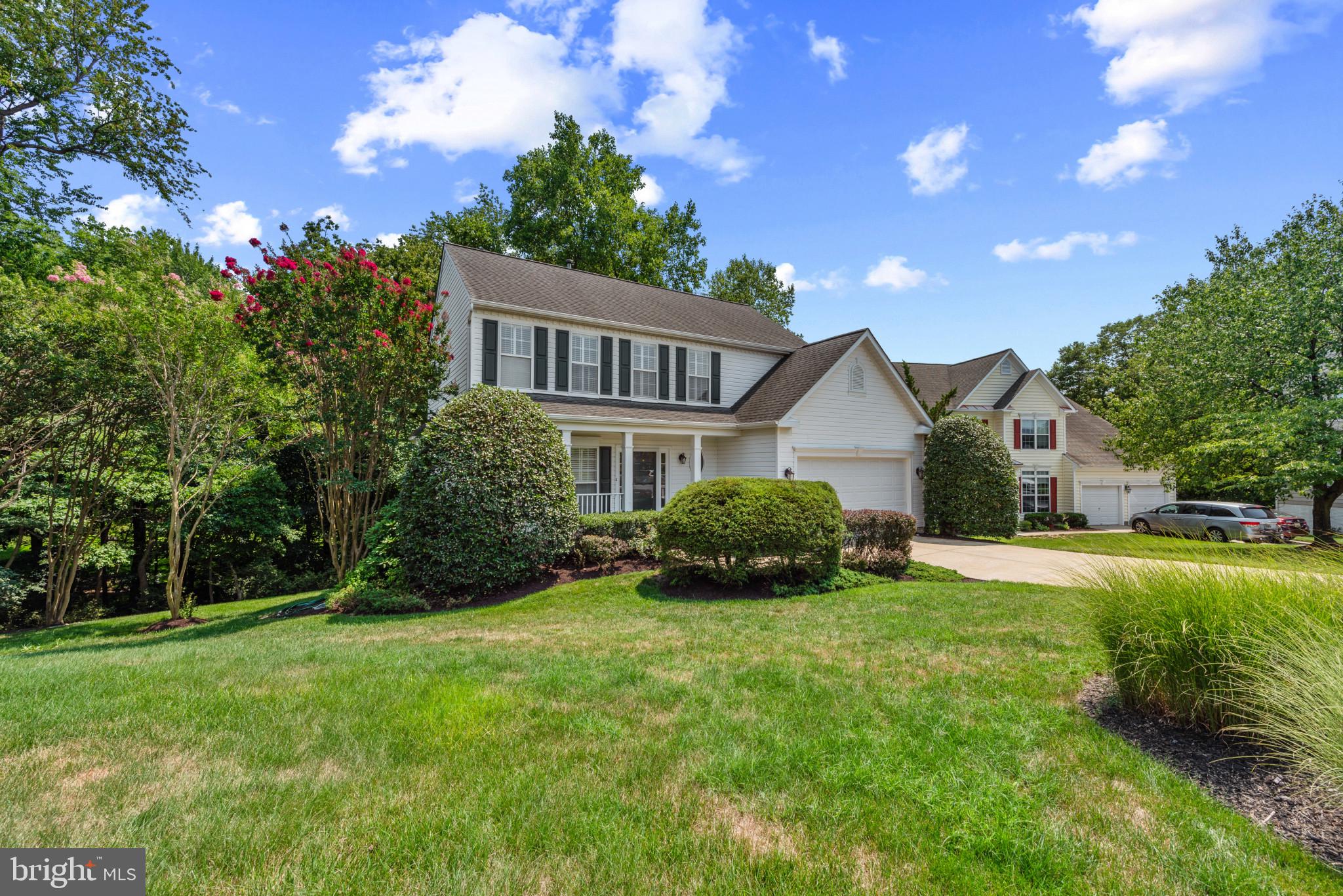 Beautifully maintained 4-bedroom, 3.5‑bath home situated on over a half‑acre, offering exceptional privacy and a serene, treed backdrop. Hardwood floors grace the main level, where the layout flows comfortably for everyday living and entertaining. The kitchen features a large pantry, granite island, and excellent workspace, opening to a spacious deck overlooking the landscaped yard—a perfect setting for outdoor dining and quiet relaxation.
A covered front porch welcomes you inside, while the finished walk‑out lower level adds outstanding versatility. This level includes a full bath, an office area, and a media/family room with extensive built‑ins, a TV niche with shelving, and a separate bar area with refrigerator—an ideal entertainment hub.
Upstairs, the primary suite offers a peaceful retreat with a luxury bath featuring a soaking tub and separate shower. Three additional spacious bedrooms complete the upper level.
With its private lot, thoughtful updates, and multiple indoor–outdoor living spaces, this home delivers comfort, functionality, and a truly inviting setting.