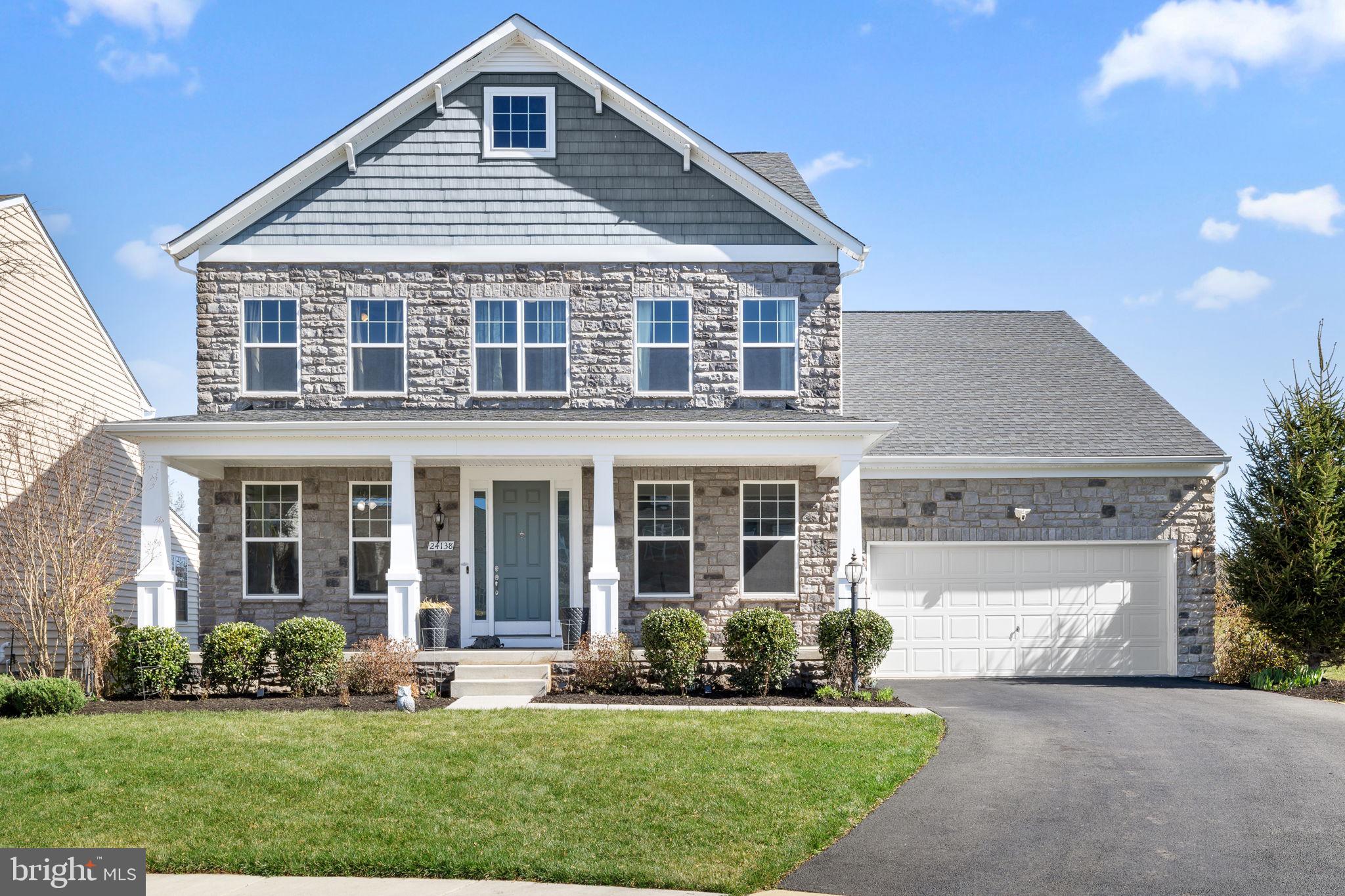 At 5700 total finished sq feet ,this home offers one of the largest finished living space in the neighborhood. Step onto your Trex deck as the sun rises over the backyard, and settle into your front porch as it sets in the evening. Few homes tell a light story quite like this one, morning to night.

Rare in today's market, this exceptional colonial is perfectly positioned at the end of a quiet cul-de-sac with no homes directly behind, open green space beside the property, and no through traffic, delivering a level of privacy that is genuinely hard to find in Aldie's newer communities.

What makes 24138 Bryce Ridge Court truly distinctive is what the original owner chose to build. The Oxnard II base model was transformed through $153,704 in documented builder upgrades, creating a home that lives and feels like a custom residence.9-foot ceilings. Stone front exterior. 2-car garage. 

MAIN LEVEL: The entire main level is finished in NL2 Middleway Oak 5-inch engineered hardwood in the Cherry 947 finish: family room, kitchen, dining room, living room, foyer, and extended foyer with a matching Open Oak staircase tying it all together. The chef's gourmet kitchen features an oversized center island with Level 4 Delicatus Brown Granita granite, built-in soap dispenser, and GE Profile stainless steel appliance package, flowing into a butler's pantry finished in the same granite. The extended family room, a structural upgrade anchored by a Pennsylvania Ledgestone fireplace. A dedicated study, mudroom, and main-level bedroom with full bath complete this level.
UPPER LEVEL: The primary suite was built out with the Owner's Luxury Bath upgrade: stand-alone soaking tub, separate shower, and an extended walk-in closet with custom organization(2026)($15,000). Additional bedrooms include a Jack-and-Jill suite and a private en-suite bedroom. Upper-level laundry with utility sink.

LOWER LEVEL: Purpose-built at time of construction, not finished after. Recreation room with extended family room, Bedroom 6 with full bath, basement den, exercise room, wet bar, and walk-up rear areaway with double doors. Every room was selected as a builder option, not an afterthought.

OWNER INVESTMENTS SINCE PURCHASE: $28,000 composite Trex deck (2022). Full HOV hub buildout with custom granite and cabinetry ( $14,000), carried into the laundry room. Custom Master closet ($15,000) (2026).

HOA $115/month. This is not a builder-grade home — it is a documented, upgraded, and lovingly maintained residence in one of Aldie's most established communities.

In addition to above: Recessed lights, LED Edison bulbs in bathrooms, wet-rated LED for the showers, Honeywell smart thermostat upgrade, driveway can park upto 6 cars.