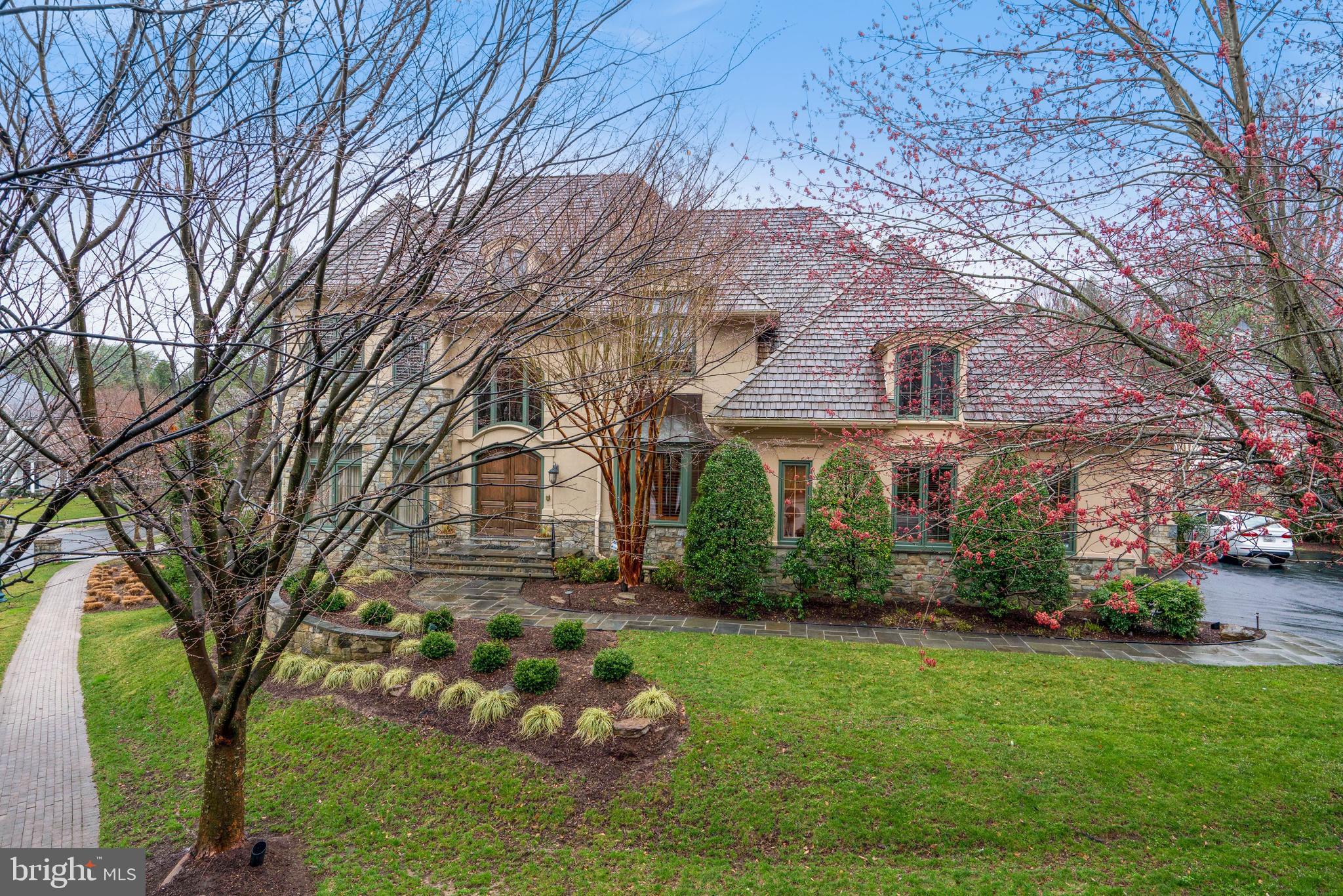 8529 Rapley Preserve Circle is a special and beautifully presented home that is perfectly situated on a 0.46 acre corner lot in Rapley Preserve in Avenel. Avenel is made up of 14 villages and Rapley Preserve is not only the newest village, it is the only community that has a gated entry with a security guard. Offering 4 Bedrooms, 5 Full Baths, 2 Half Baths, and a Guest/Au Pair Suite, this elegant residence spans approximately 7,100 finished SF throughout 3 finished floors. Each level has been thoughtfully designed to suit nearly every lifestyle, including a Gourmet Kitchen, private Study, a Game Room, Exercise Room, Theater Room and much more. There are two attached Garages – one that is for two vehicles and a second single garage that is currently an indoor basketball half court with soundproofing and lighting. The living space is extended outdoors to an expansive Deck with a Pergola and a large Terrace. Avenel is a picturesque and beautifully designed resort-like community in Montgomery County with 900 luxury homes. Amenities abound with the best of the best offered here in extraordinary Avenel. The professional TPC/PGA Golf Course is in the center of the neighborhood, boasting a spectacular experience (separate memberships available). The Avenel Swim & Tennis Club is another wonderful feature of the community with 3 pools and 6 tennis courts. Avenel Park, popular trails, and an adjacent privately-owned Equestrian Center encourage an active and outdoor lifestyle.