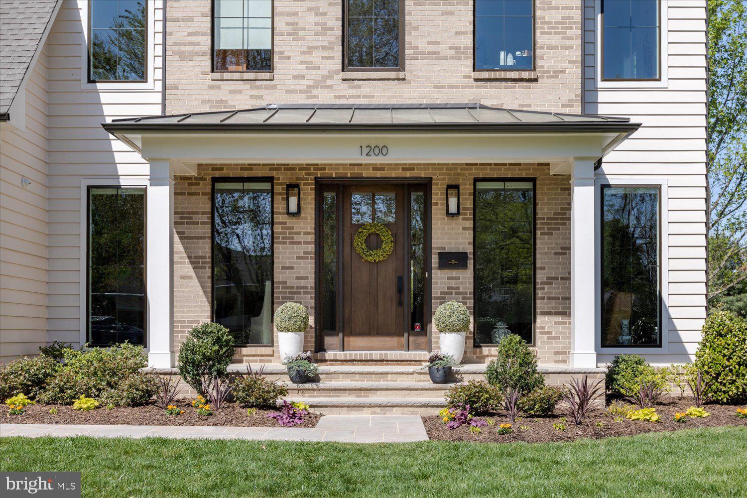 Open Sunday, 4/16, 1-3pm,   Offers due by 4PM Tuesday, 4/18. No offers will be reviewed before the deadline.  Nearly new construction by Beacon Crest Homes in sought-after McLean neighborhood!  Barely 3 years old and loaded with custom upgrades including custom closets, window shades, generator, pergola, custom garage finishes, EV outlet 30 amps charging outlet , water softener with reverse osmosis water system and more.  Enjoy relaxed elegance throughout this 6000 square foot house:  10’ ceilings, open vistas, floor to ceiling windows in the living and dining rooms, wide hickory plank wood floors, and a calming neutral color palate.  The chef’s kitchen and adjoining family room , full size walk in pantry constitute the heart of this welcoming home.  Also on the main level: a bedroom with en-suite bath (or home office?), and a spacious mudroom connecting to 2 separate garages (4 cars total!).  The spacious primary bedroom, on the second floor, is a luxury retreat featuring double walk-in closets and a spa-like en-suite bathroom.  Three additional bedrooms, each with en-suite bath, plus a large laundry room, complete this level.  A large recreation / home entertainment area is found on the lower level, along with a 6th bedroom with en-suite bath, a home gym for serious fitness sessions plus a sizeable storage room with custom shelving.  Surprisingly low monthly energy costs for a house of this size.