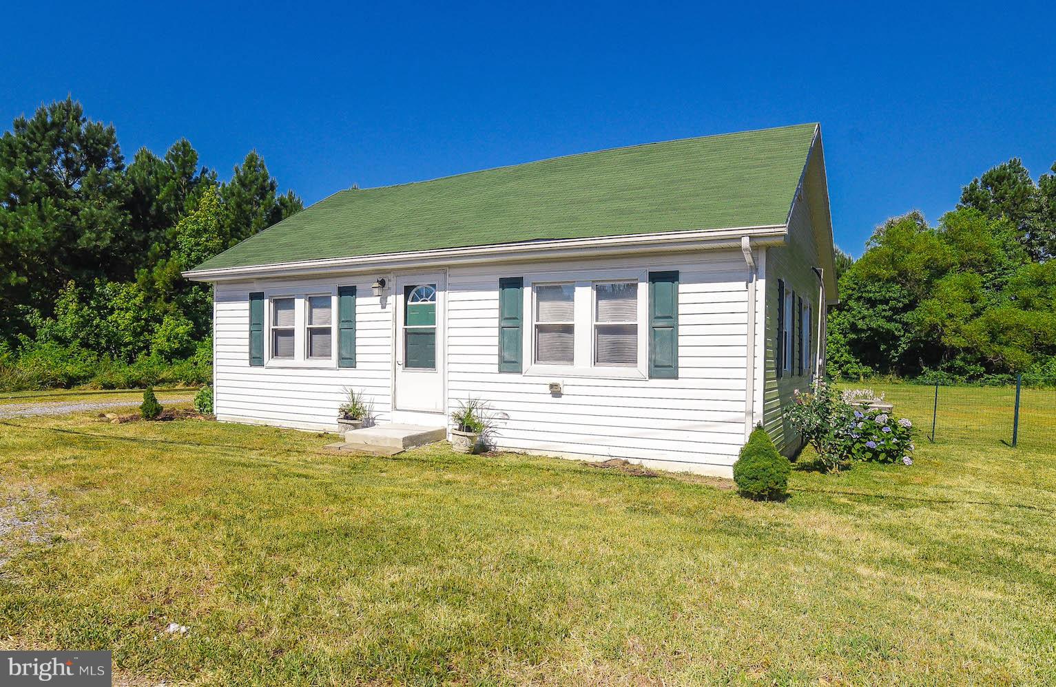 PRICED REDUCED!!  SUPER CUTE AND SO AFFORDABLE HOME!   One level  living!  Open kitchen with breakfast bar that flows into the spacious living room.  There are two bedrooms AND an additional room (used as a bedroom - no closet) and full bath. Three-acre lot - located just minutes from Cobb Island and a short commute to VA.  SELLING AS-IS!